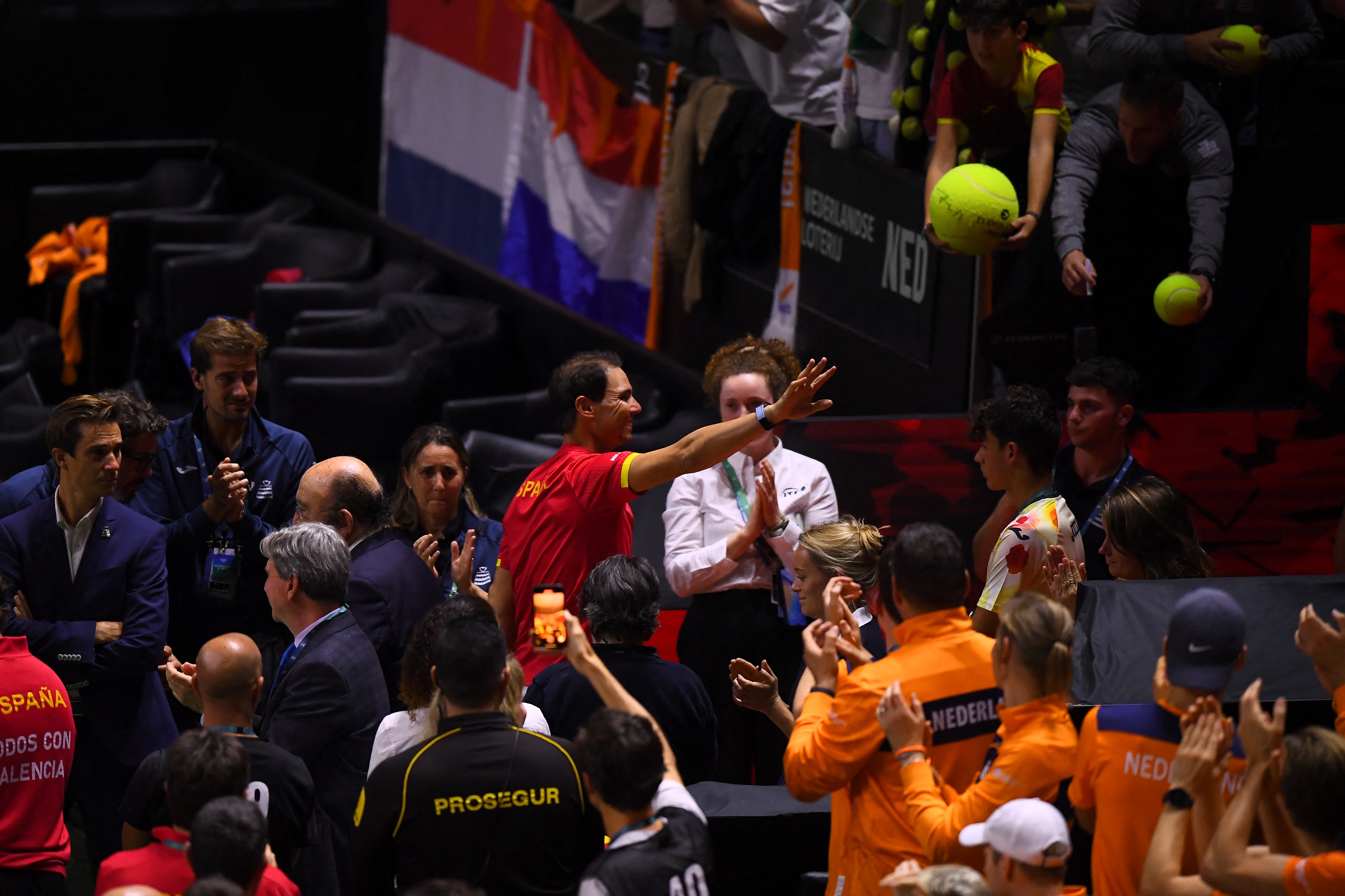 Rafael Nadal waves to crowd.