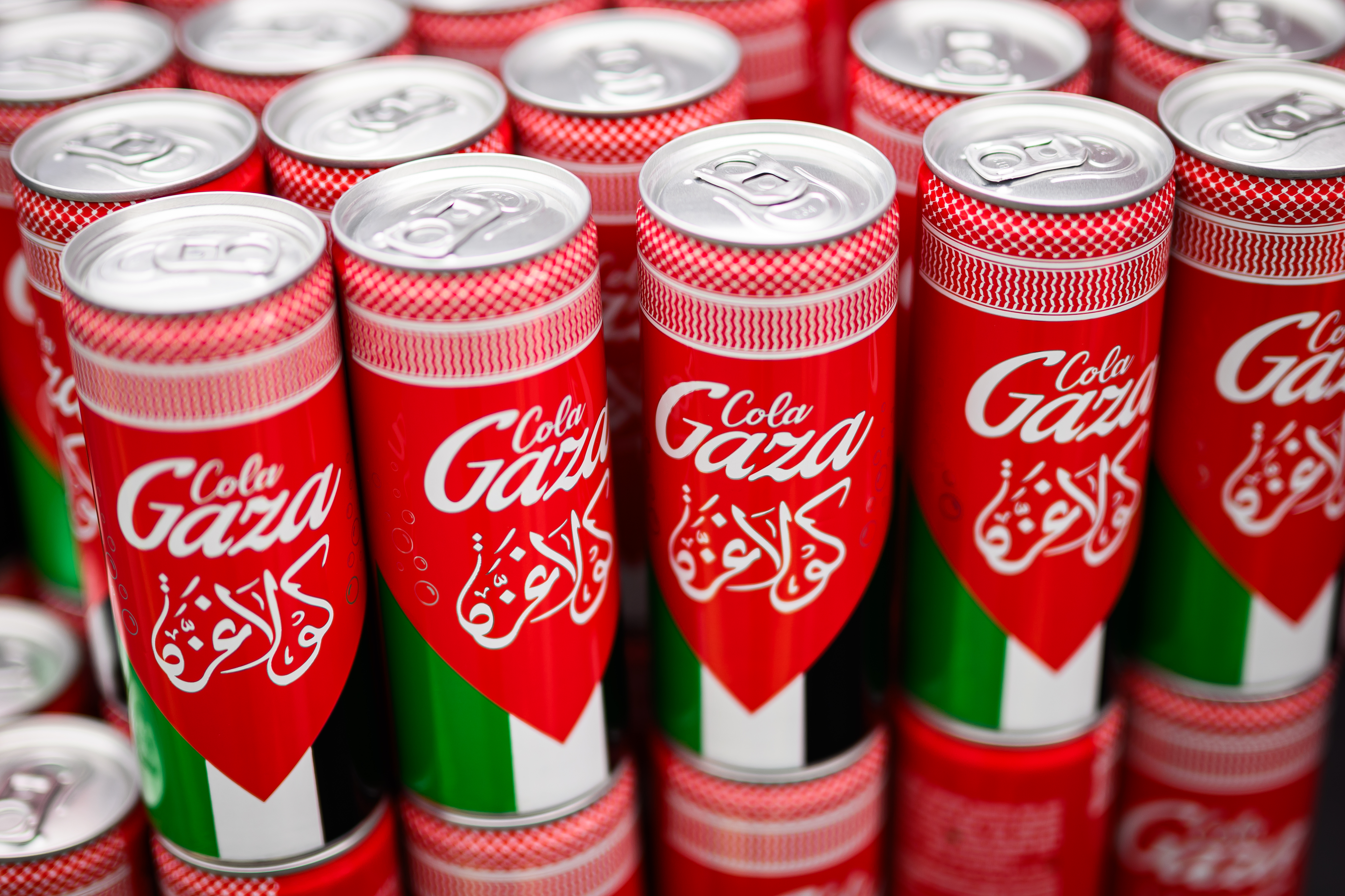 Cans of Cola Gaza are seen for sale as protestors take part in a National March for Gaza
