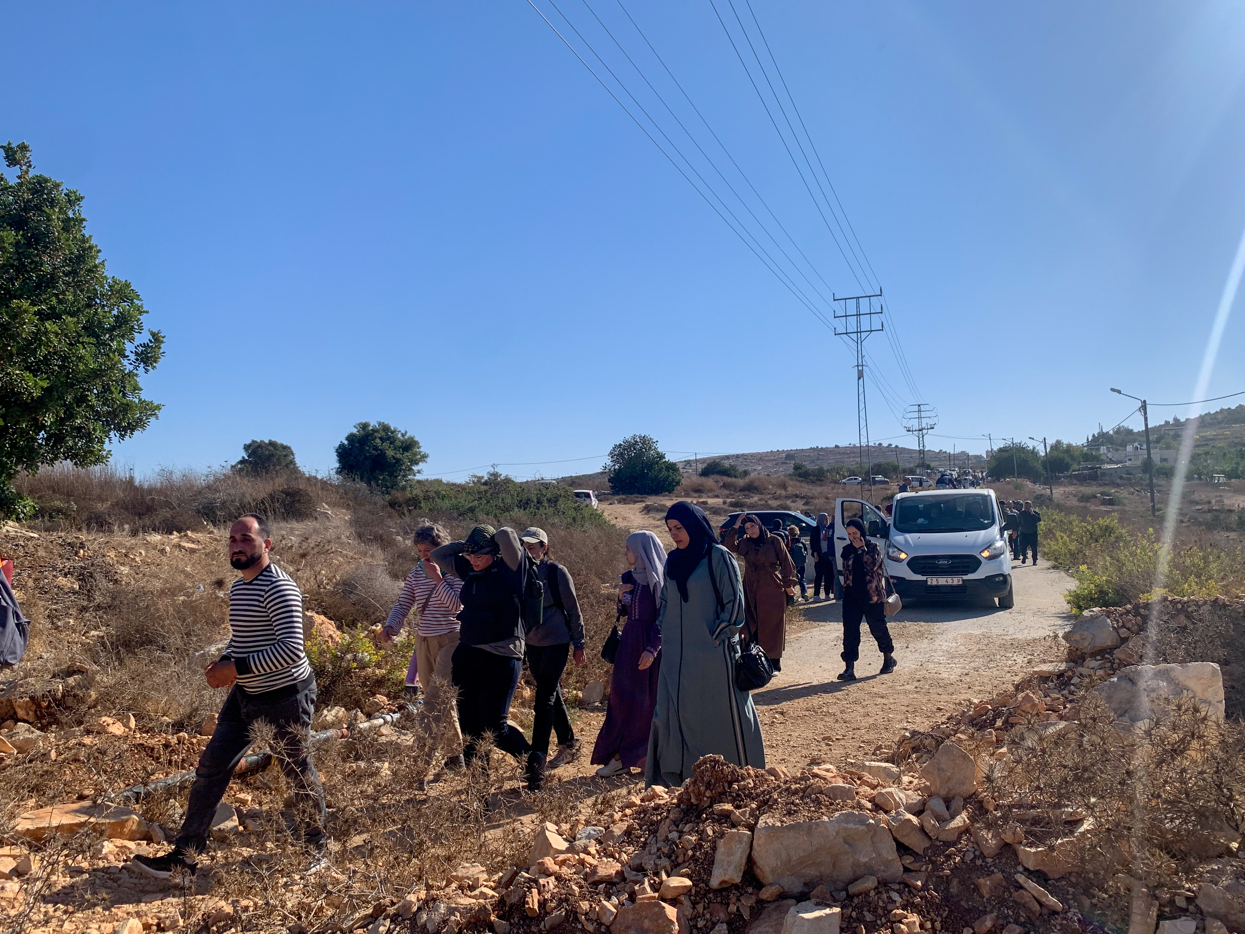 People joining solidarity harvest [Al Jazeera]