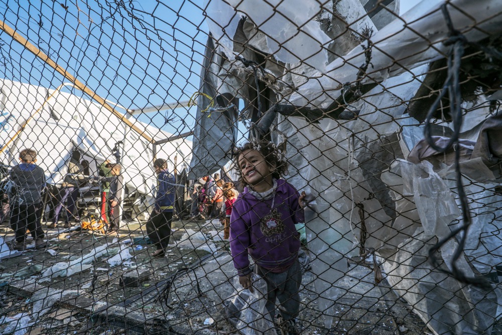 epa11778090 An internally displaced Palestinian girl stands between destroyed tents inside Al Dura stadium following an Israeli air strike in the west of Deir al-Balah town, central Gaza Strip, 15 December 2024. The Palestinian Ministry of Health in Gaza reported that at least 22 people were killed on December 14 during Israeli airstrikes on the central Gaza Strip. According to the UN, at least 1.9 million people (or nine in ten people) in the Gaza Strip are internally displaced, including people who have been repeatedly displaced. Since October 2023, only about 11 percent of the Gaza Strip has not been placed under Israeli-issued evacuation orders, the UN aid coordination office OCHA said. EPA-EFE/MOHAMMED SABER