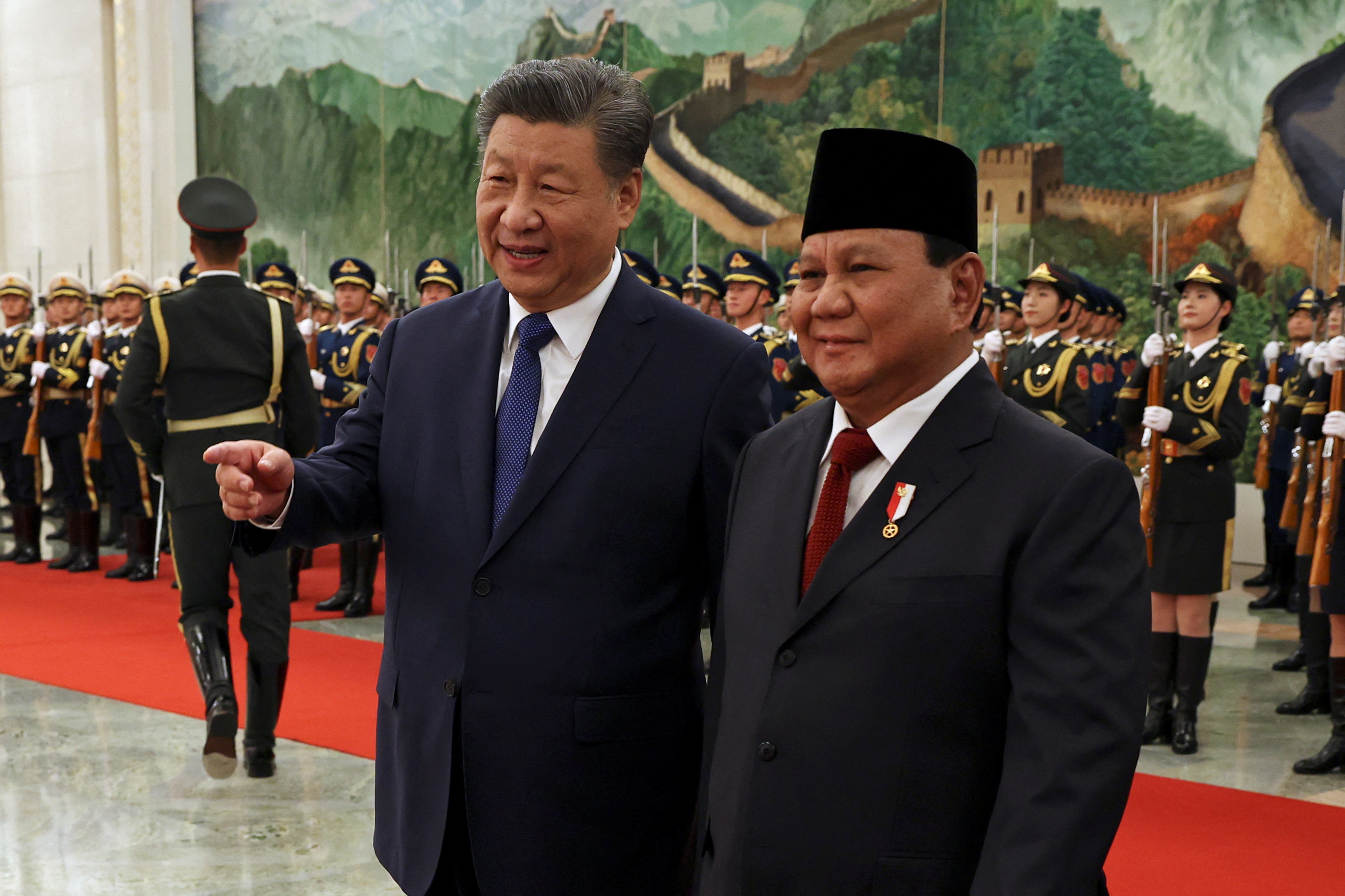 Chinese President Xi Jinping and Indonesian President Prabowo Subianto attend a welcome ceremony at the Great Hall of the People in Beijing, China November 9, 2024. REUTERS/Florence Lo/Pool
