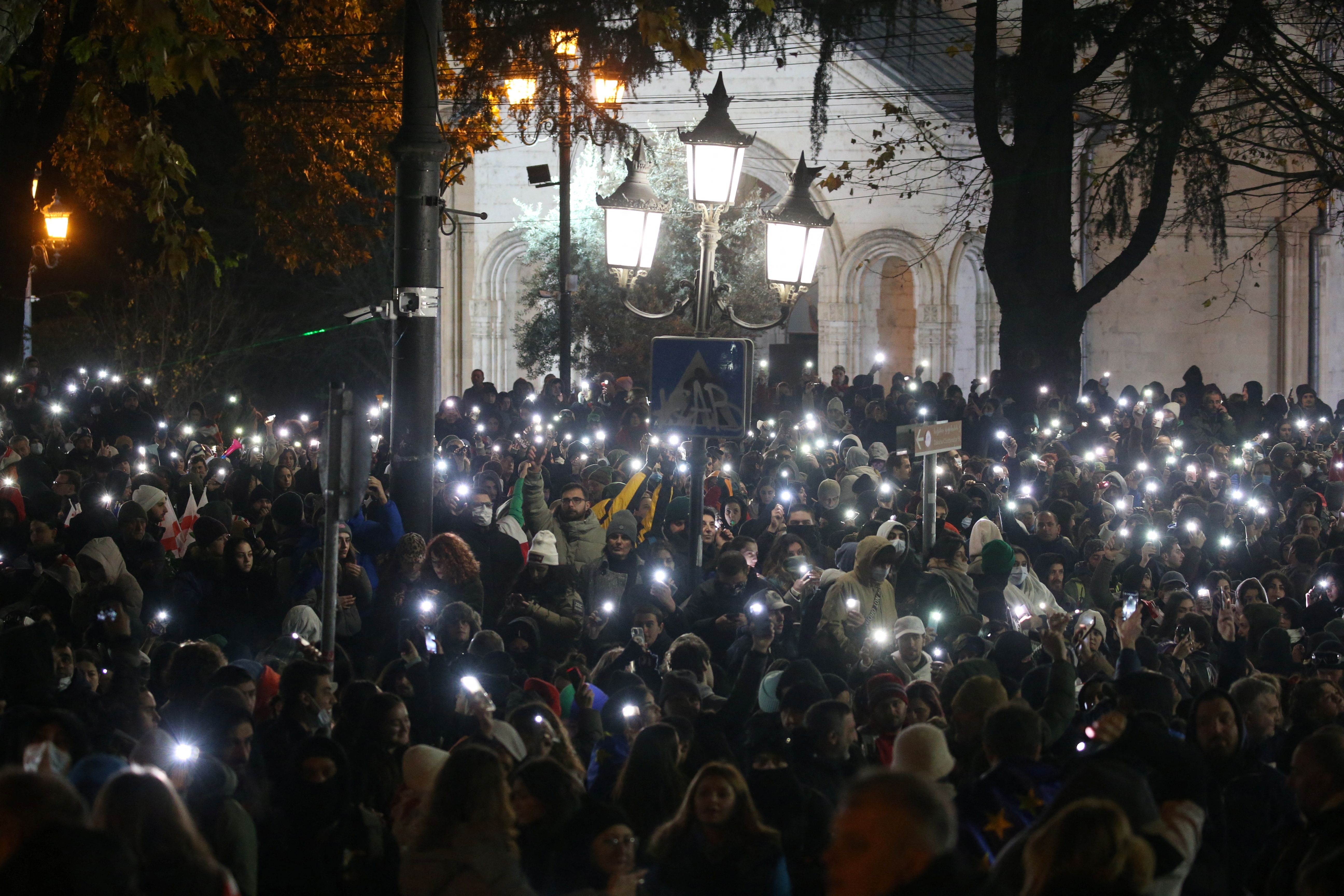 Supporters of Georgia's opposition parties hold a rally to protest against the government's decision to suspend talks on joining the European Union, in Tbilisi,