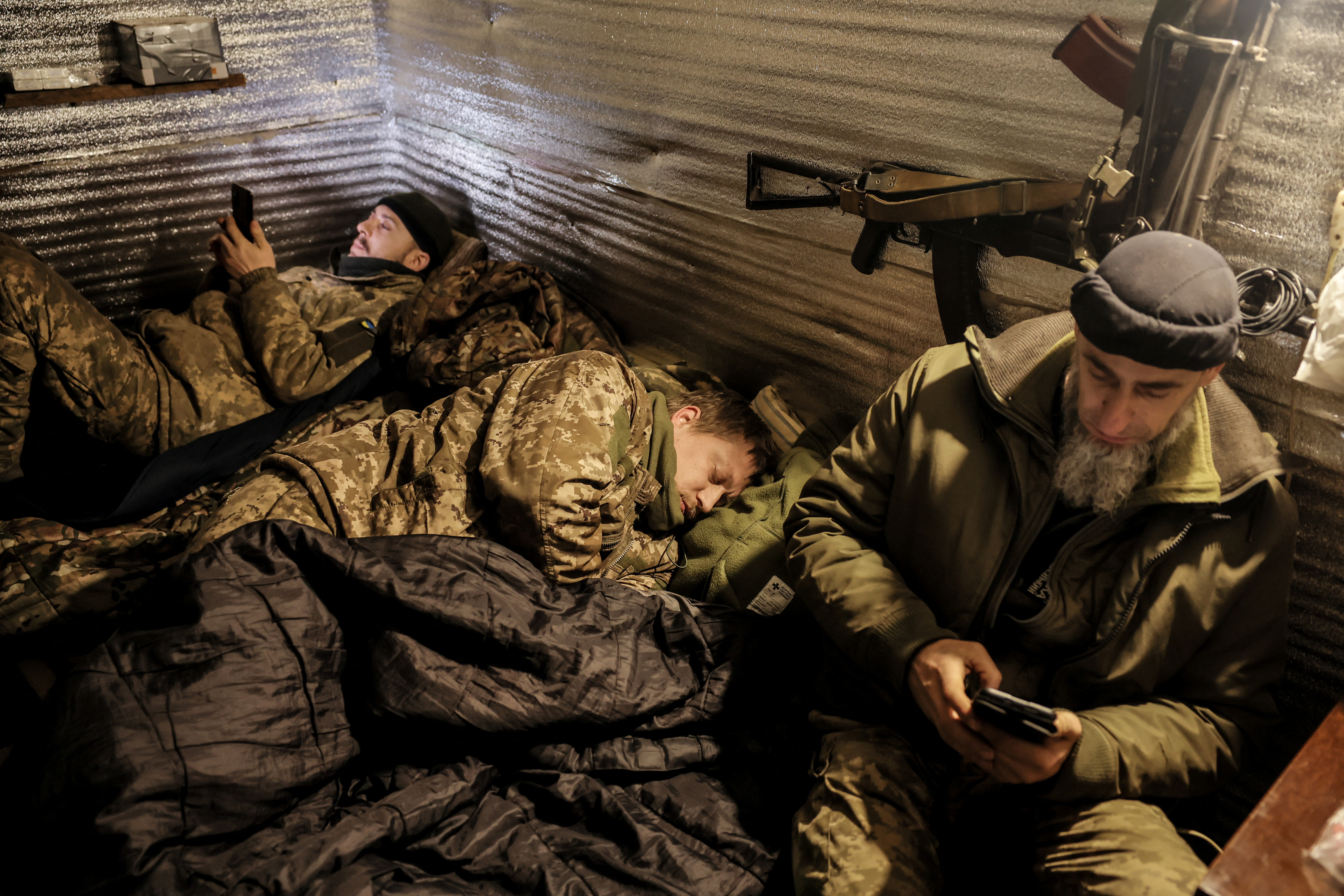 Servicemen of 24th Mechanized brigade named after King Danylo of the Ukrainian Armed Forces rest at their position in a front line, amid Russia's attack on Ukraine, near the town of Chasiv Yar in Donetsk region, Ukraine December 12, 2024. Oleg Petrasiuk/Press Service of the 24th King Danylo Separate Mechanized Brigade of the Ukrainian Armed Forces/Handout via REUTERS ATTENTION EDITORS - THIS IMAGE HAS BEEN SUPPLIED BY A THIRD PARTY.