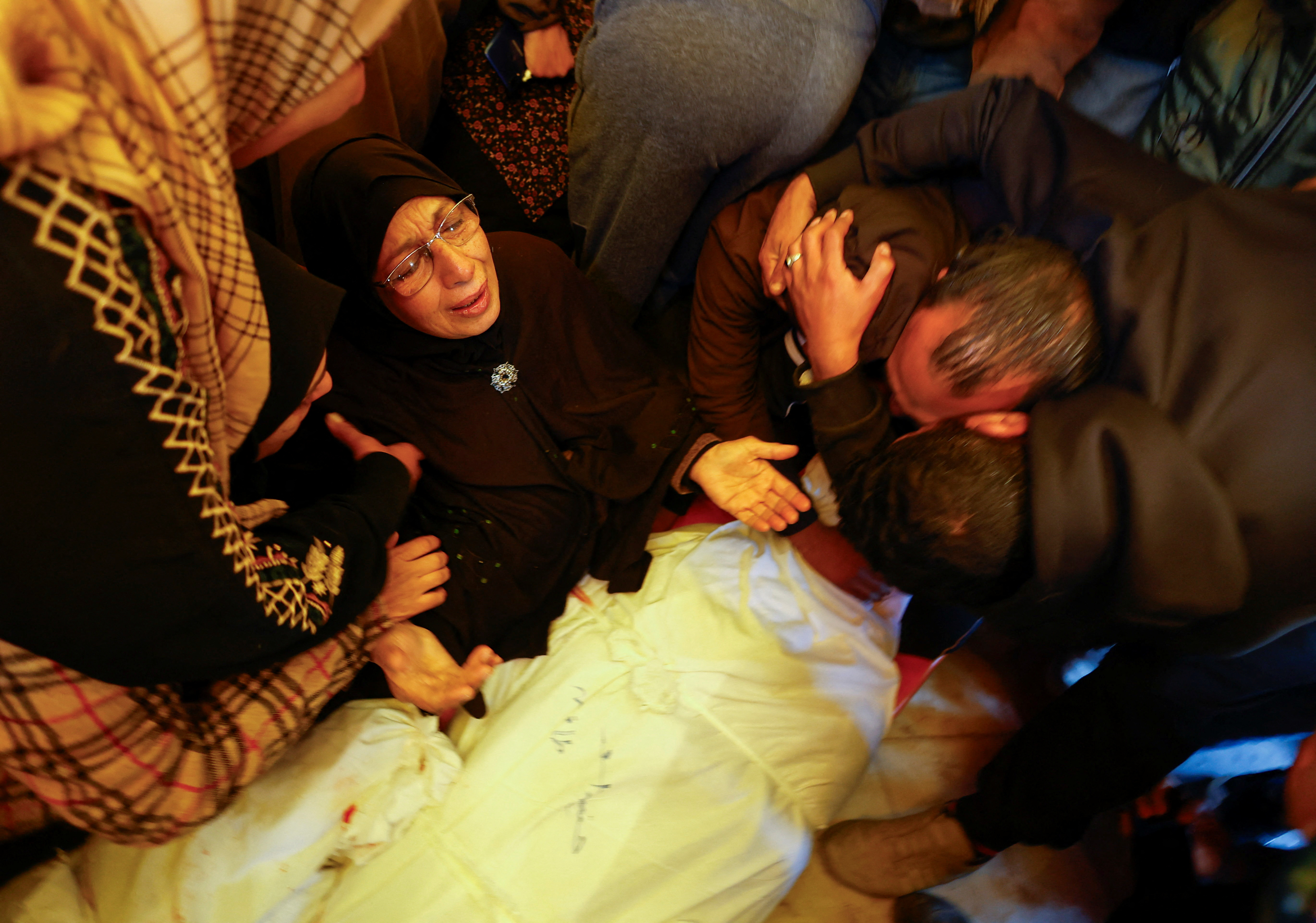 Mourners at Nasser hospital in Khan Younis, Gaza