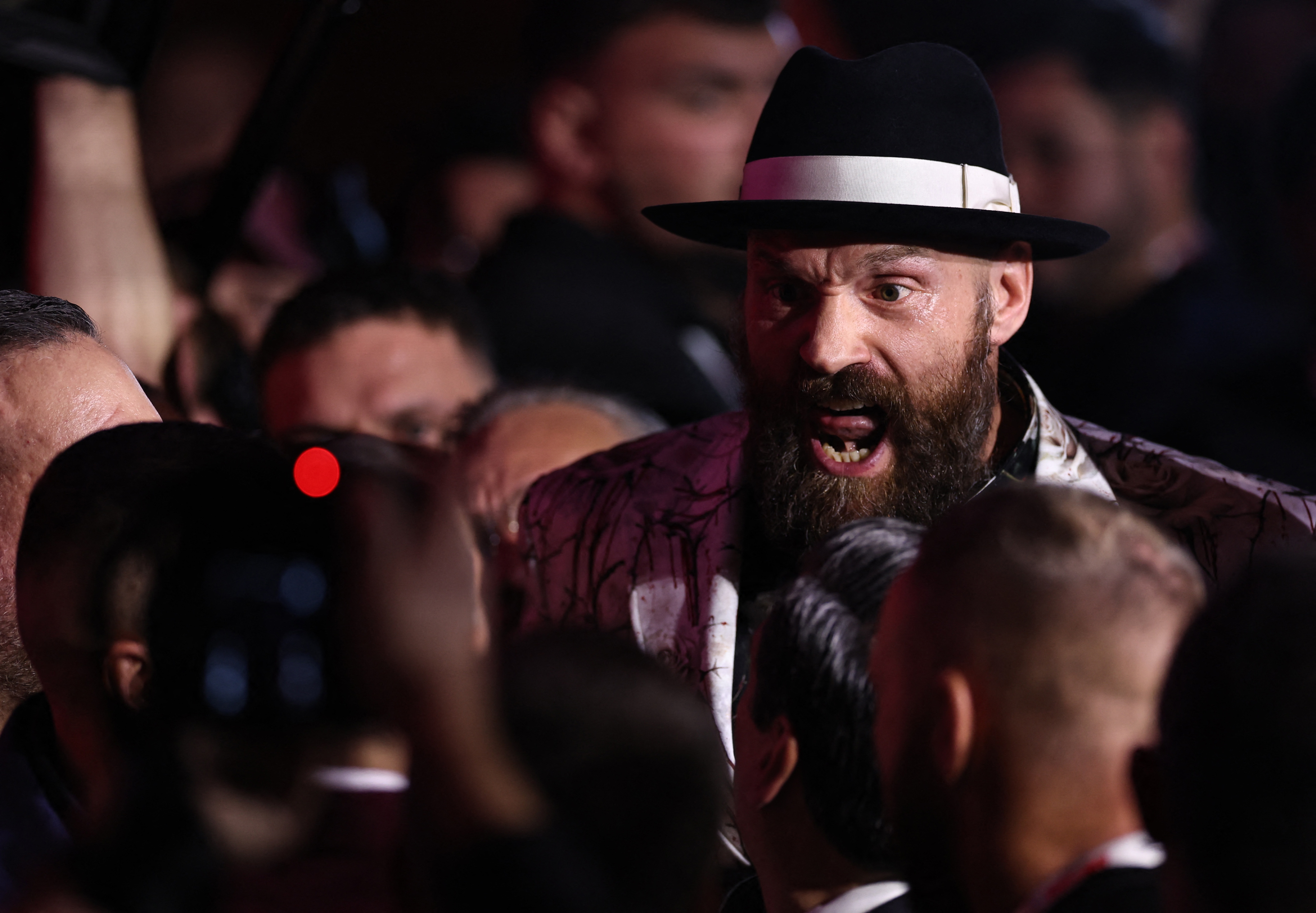 Boxing - Heavyweight World Title Fight - Oleksandr Usyk v Tyson Fury - Press Conference - VIA Riyadh, Riyadh, Saudi Arabia - December 19, 2024 Tyson Fury reacts during the press conference REUTERS/Hamad I Mohammed