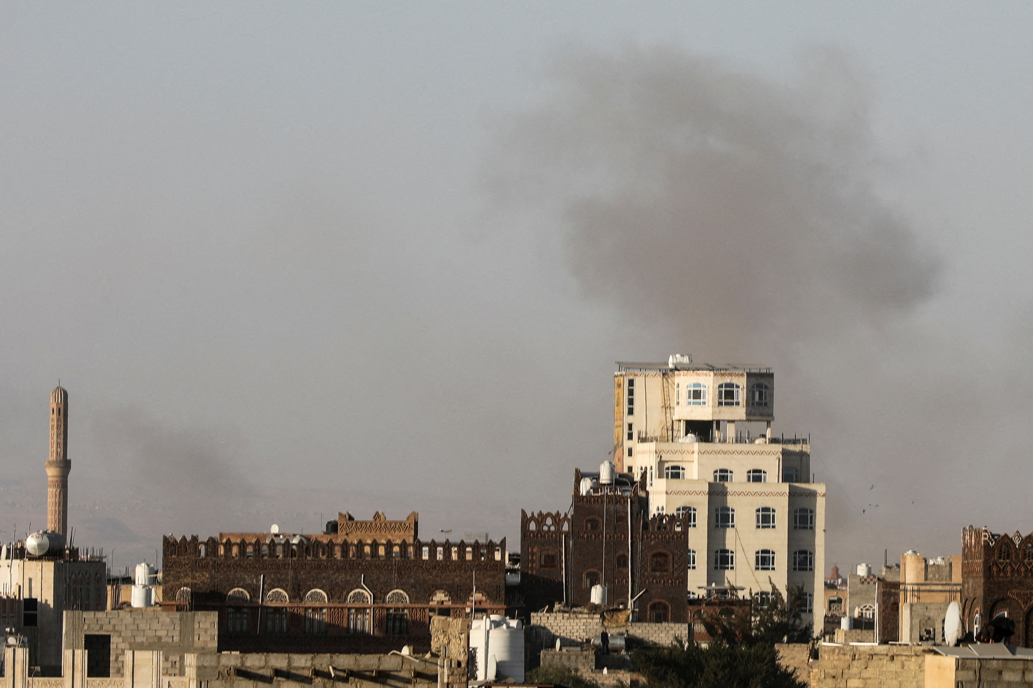 Smoke rises after Israeli strikes near Sanaa airport, in Sanaa, Yemen, December 26, 2024