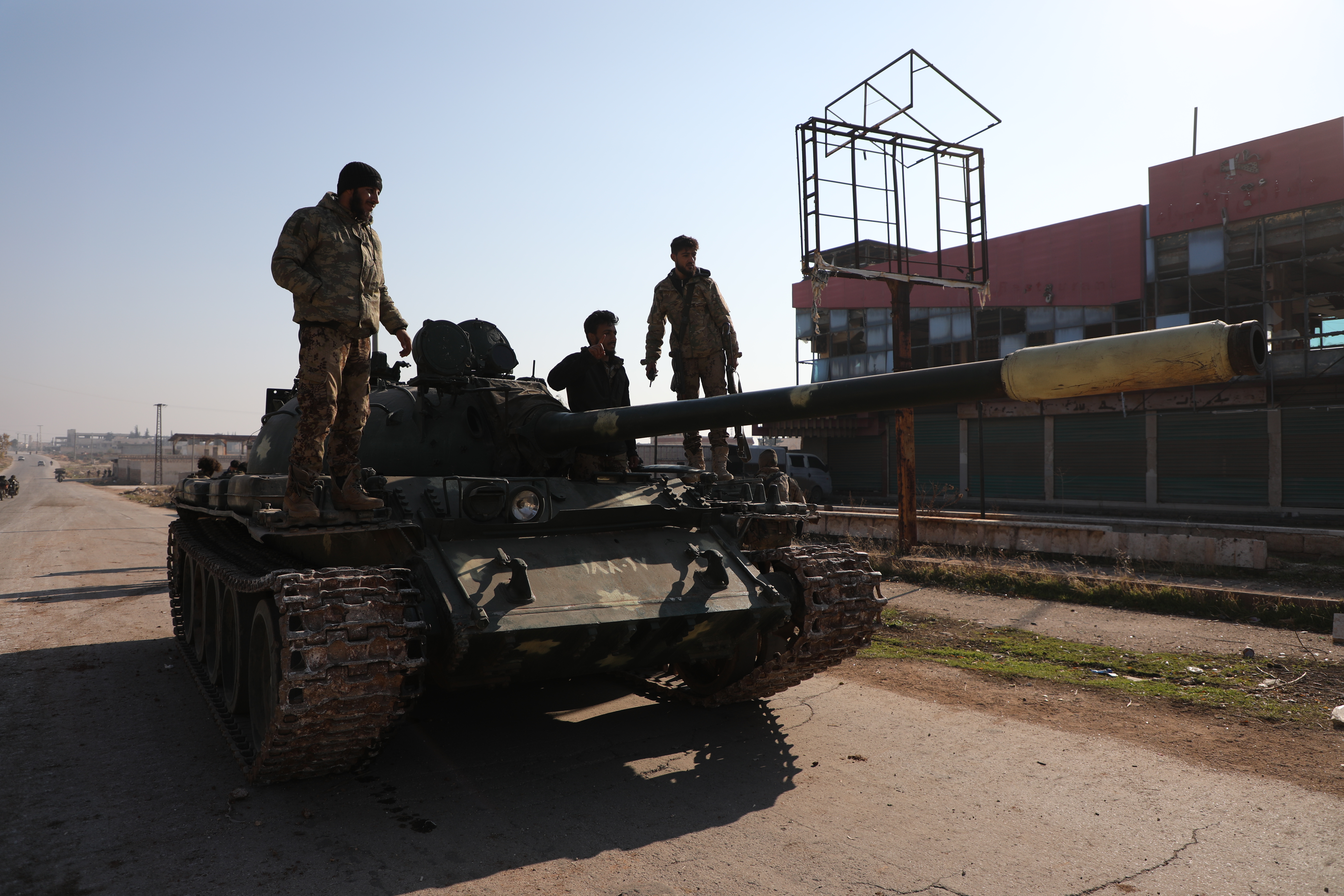 Fighters on a tank in Aleppo. [Ali Haj Suleiman/Al Jazeera]