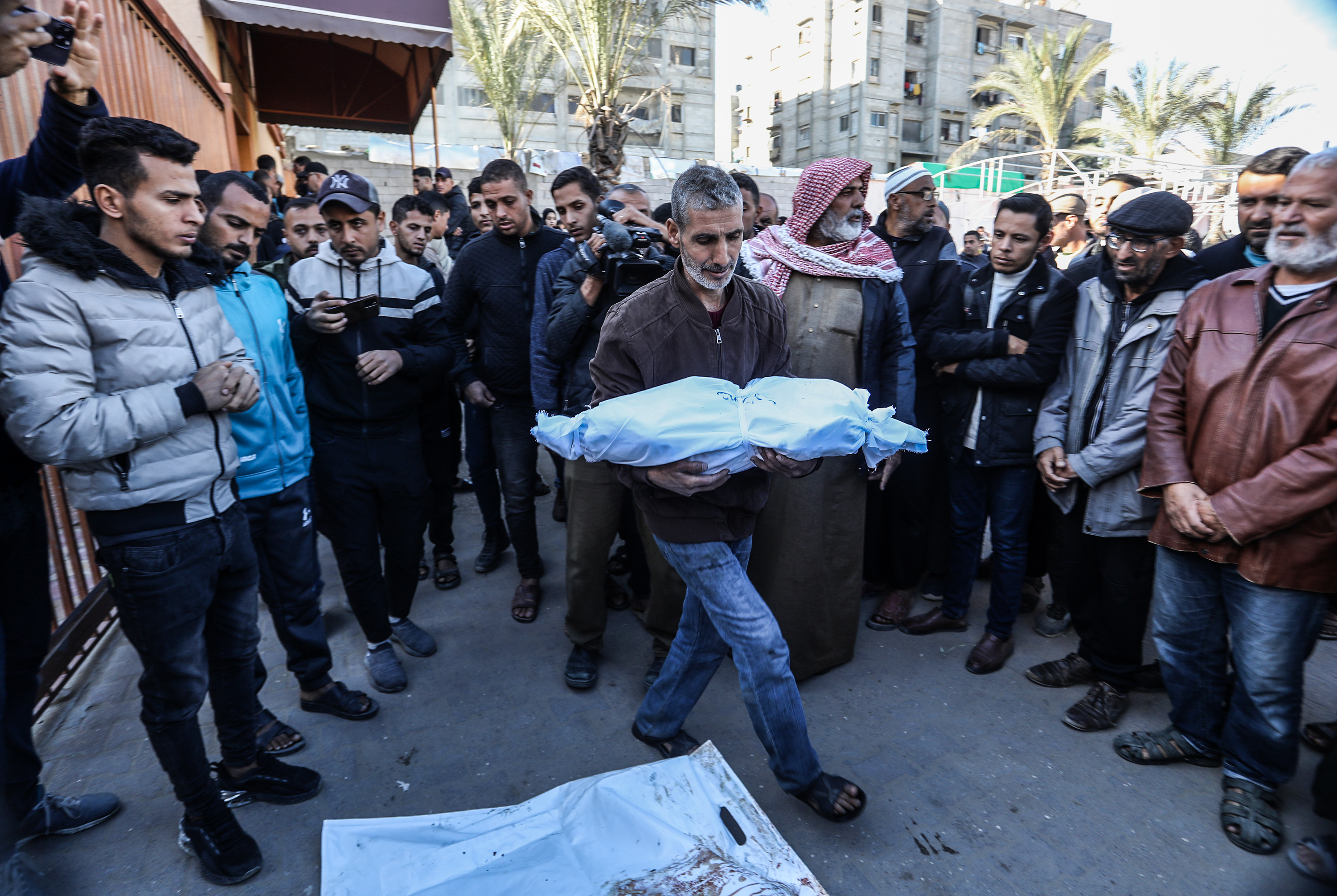 KHAN YUNIS, GAZA - DEC 5: The bodies of Palestinians are taken from the morgue of Nasser Hospital for funeral prayers and burial after the Israeli attacks in Al-Mawasi Area, in Khan Yunis, Gaza on December 5, 2024. Relatives of those who lost their lives were mourned. It was reported that there were casualties and wounded as a result of the Israeli army's attacks on the al-Mawasi area of Khan Yunis city in the Gaza Strip.