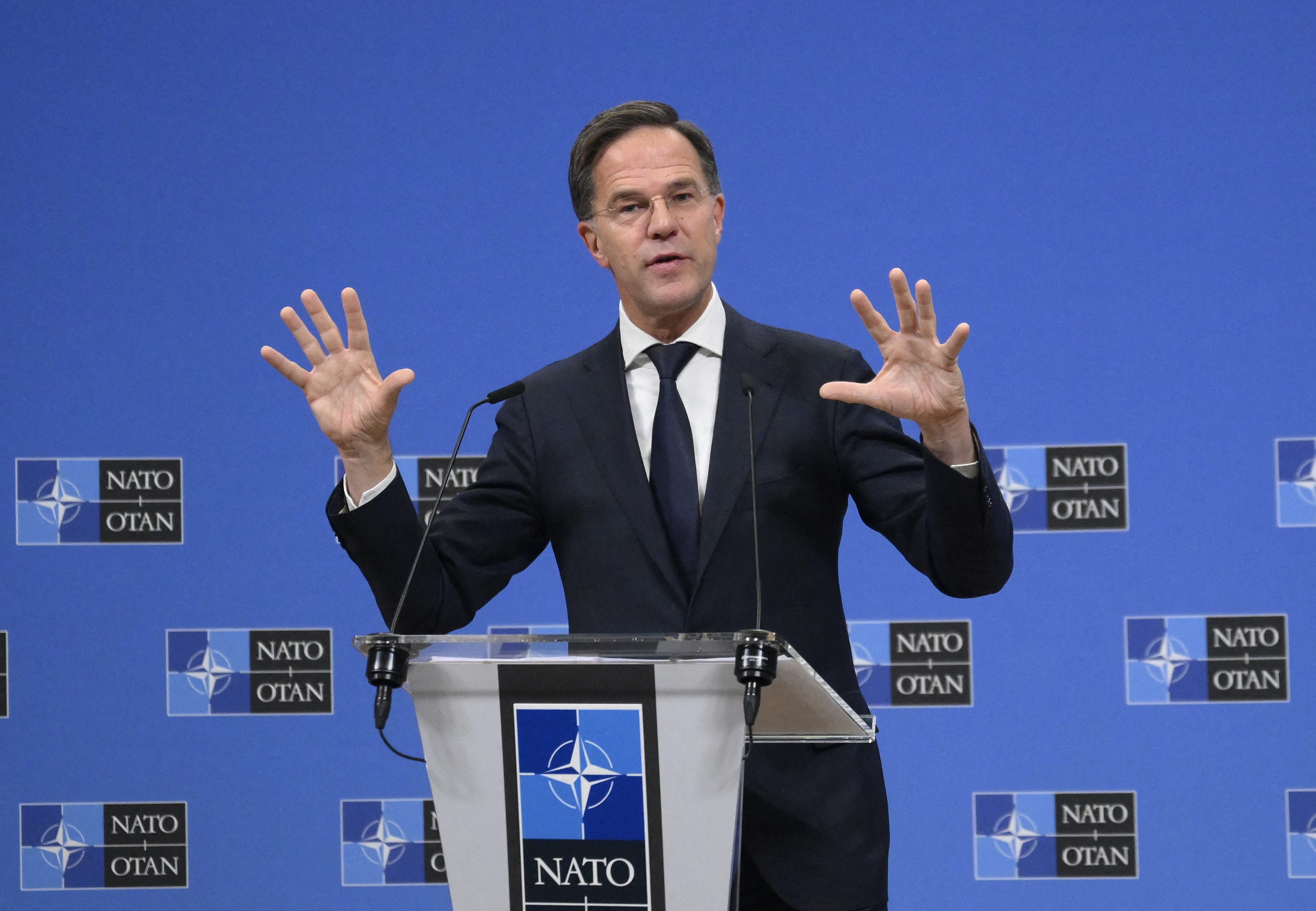 NATO's Dutch Secretary General Mark Rutte gestures as he answers journalists' questions during a NATO (North Atlantic Treaty Oganization) Foreign Ministers' meeting at the Nato headquarters in Brussels, on December 3, 2024. (Photo by JOHN THYS / AFP)