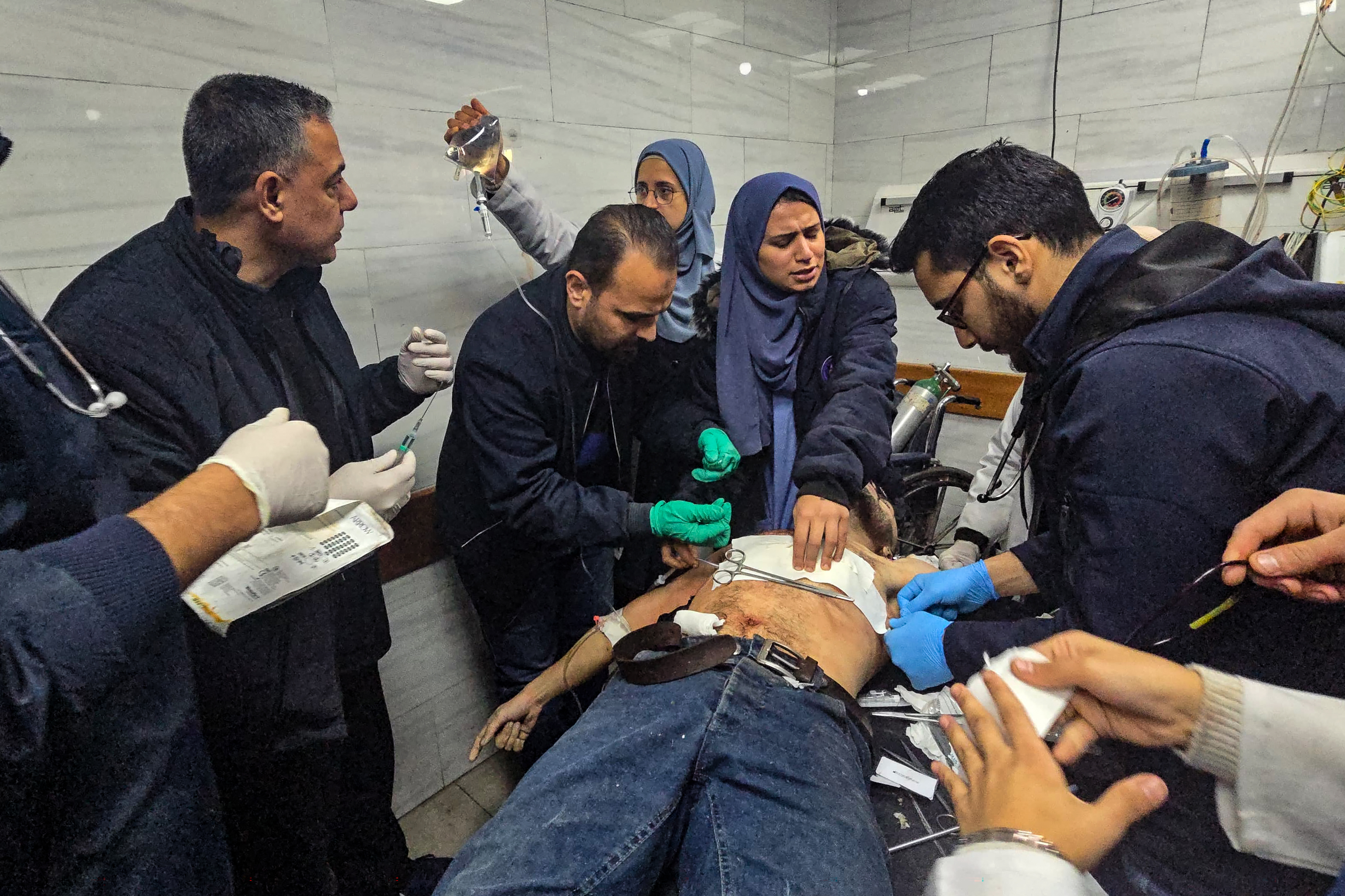 A victim is treated inside the Kamal Adwan hospital in Beit Lahia