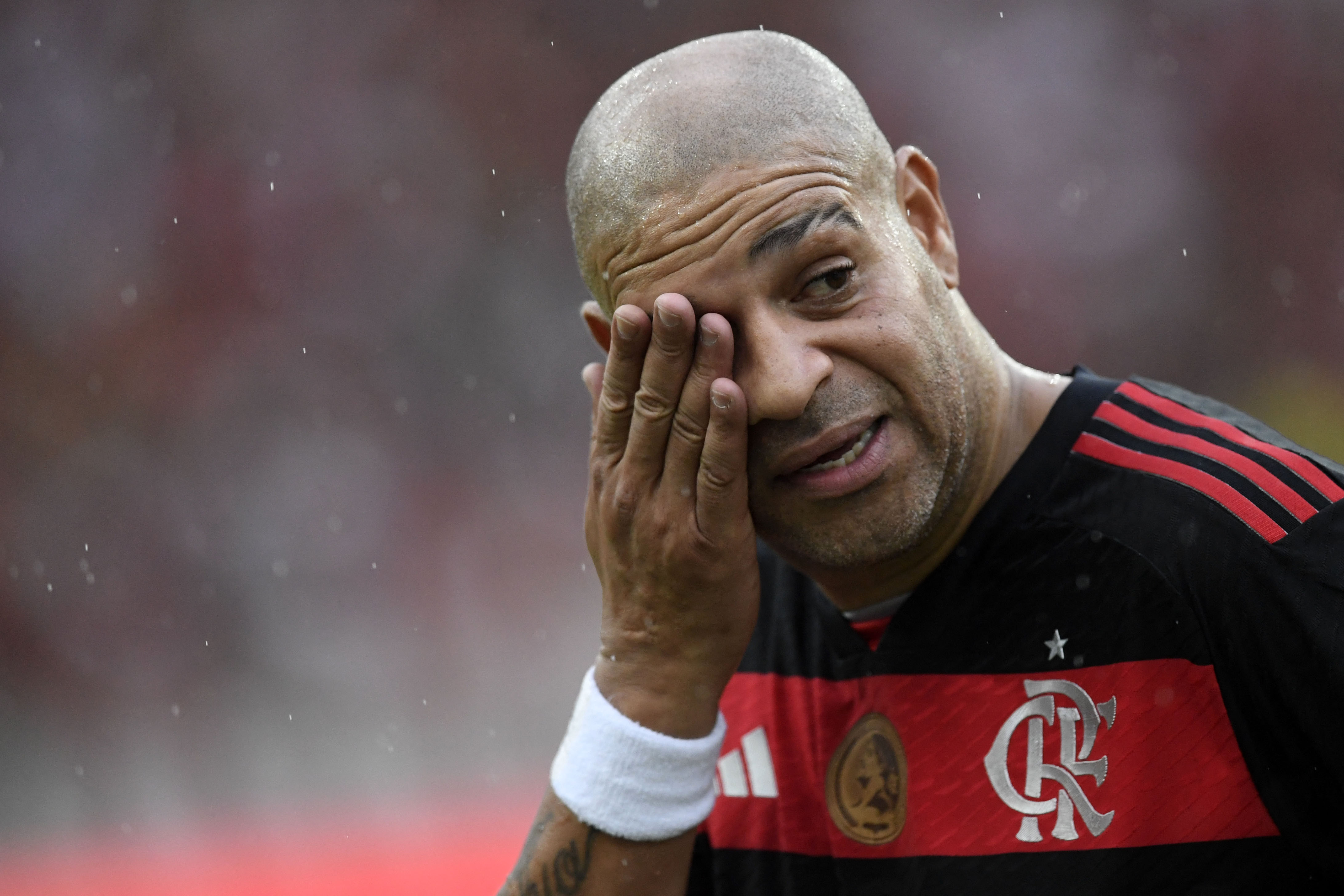 Adriano crying on pitch.