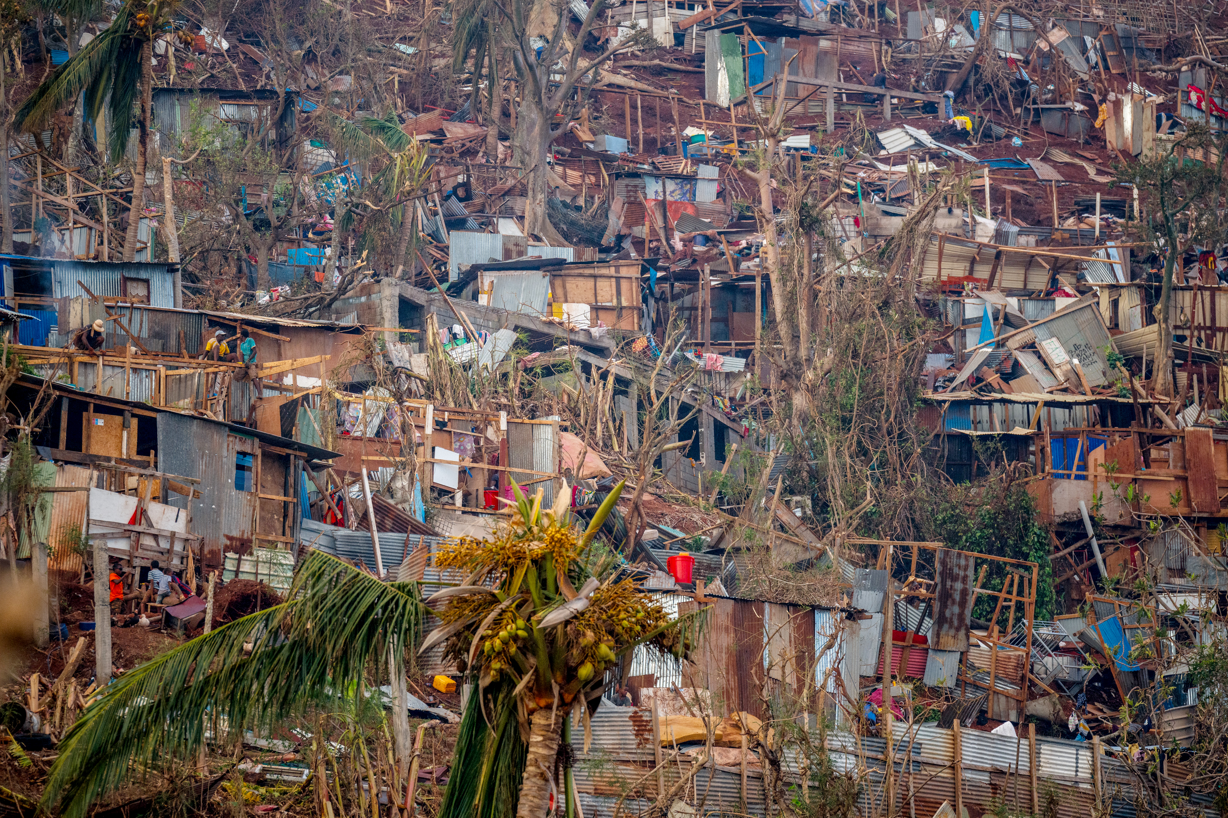 This photograph shows damages in a slum with precarious housing in Mamoudzou, on the French Indian Ocean territory of Mayotte, on December 17, 2024, after the cyclone Chido hit the archipelago