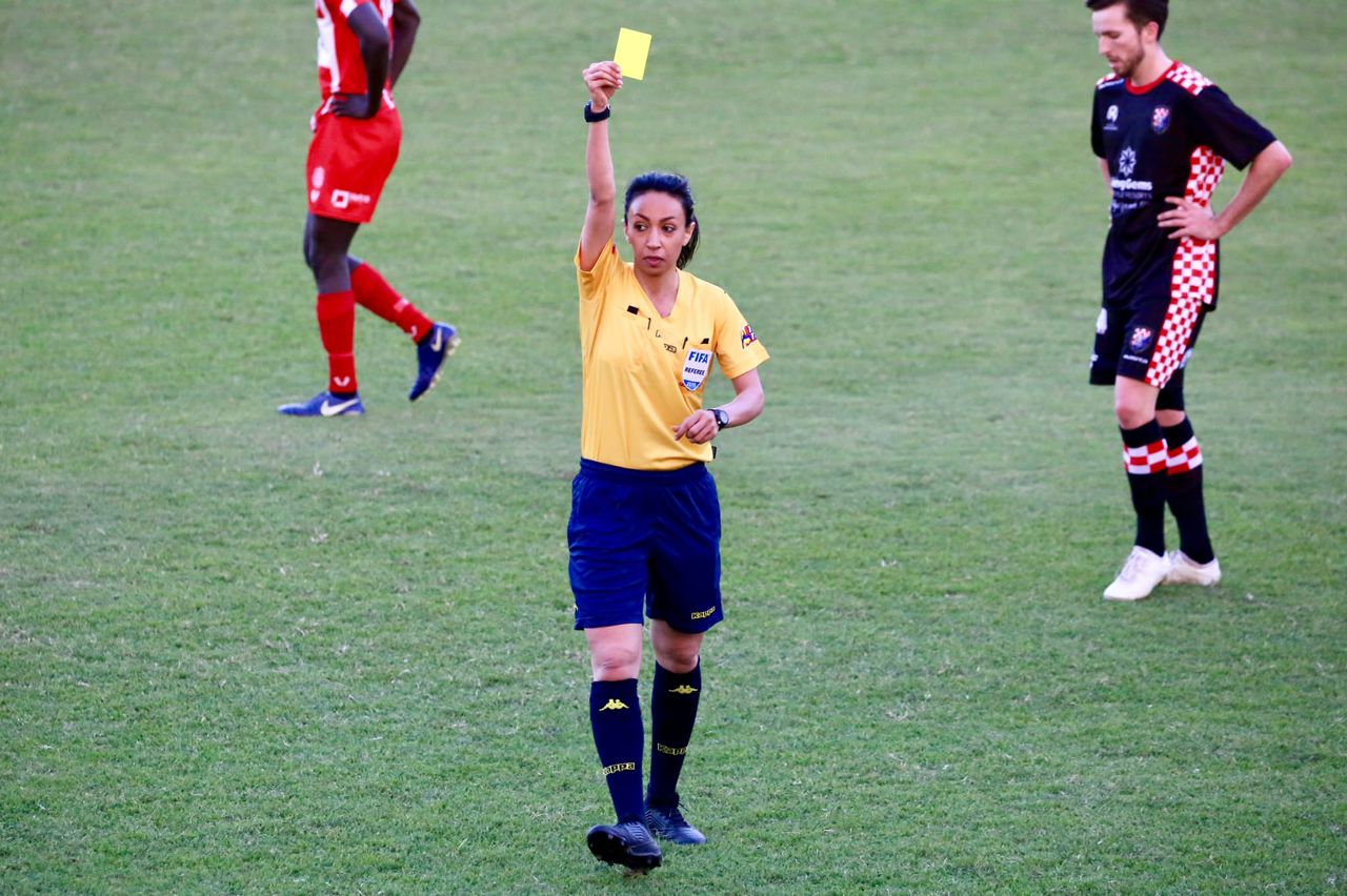 Mahsa Gorbani as a football referee.