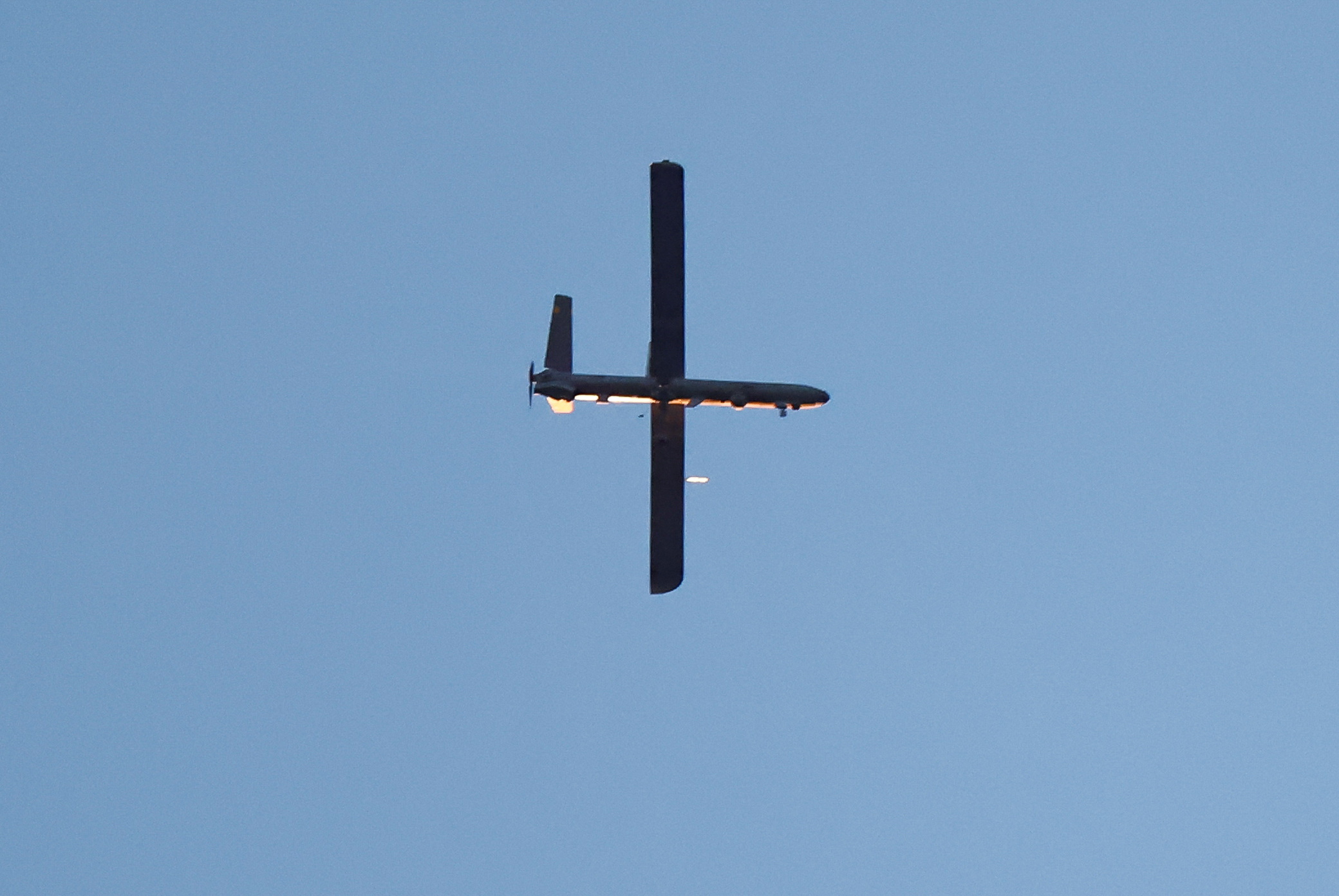 A drone flies in the sky, amid the ongoing conflict between Israel and the Palestinian Islamist group Hamas, near the Israel's border with Gaza, as seen from southern Israel, December 15, 2023. REUTERS/Clodagh Kilcoyne