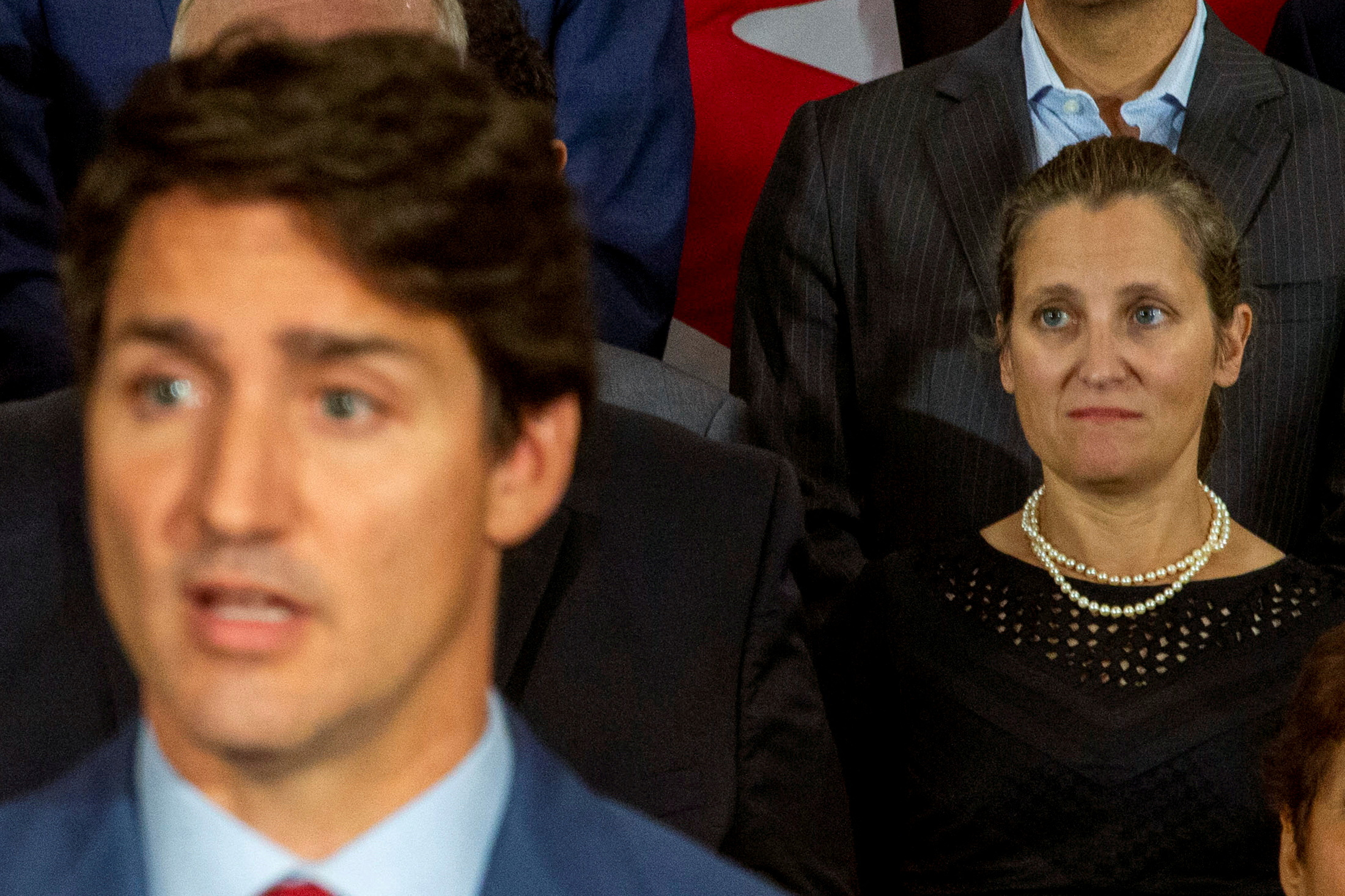 FILE PHOTO: Canada's Foreign Minister Chrystia Freeland (R) watches as Prime Minister Justin Trudeau speaks during an election campaign stop in Toronto, Ontario, Canada September 20, 2019. REUTERS/Carlos Osorio/File Photo