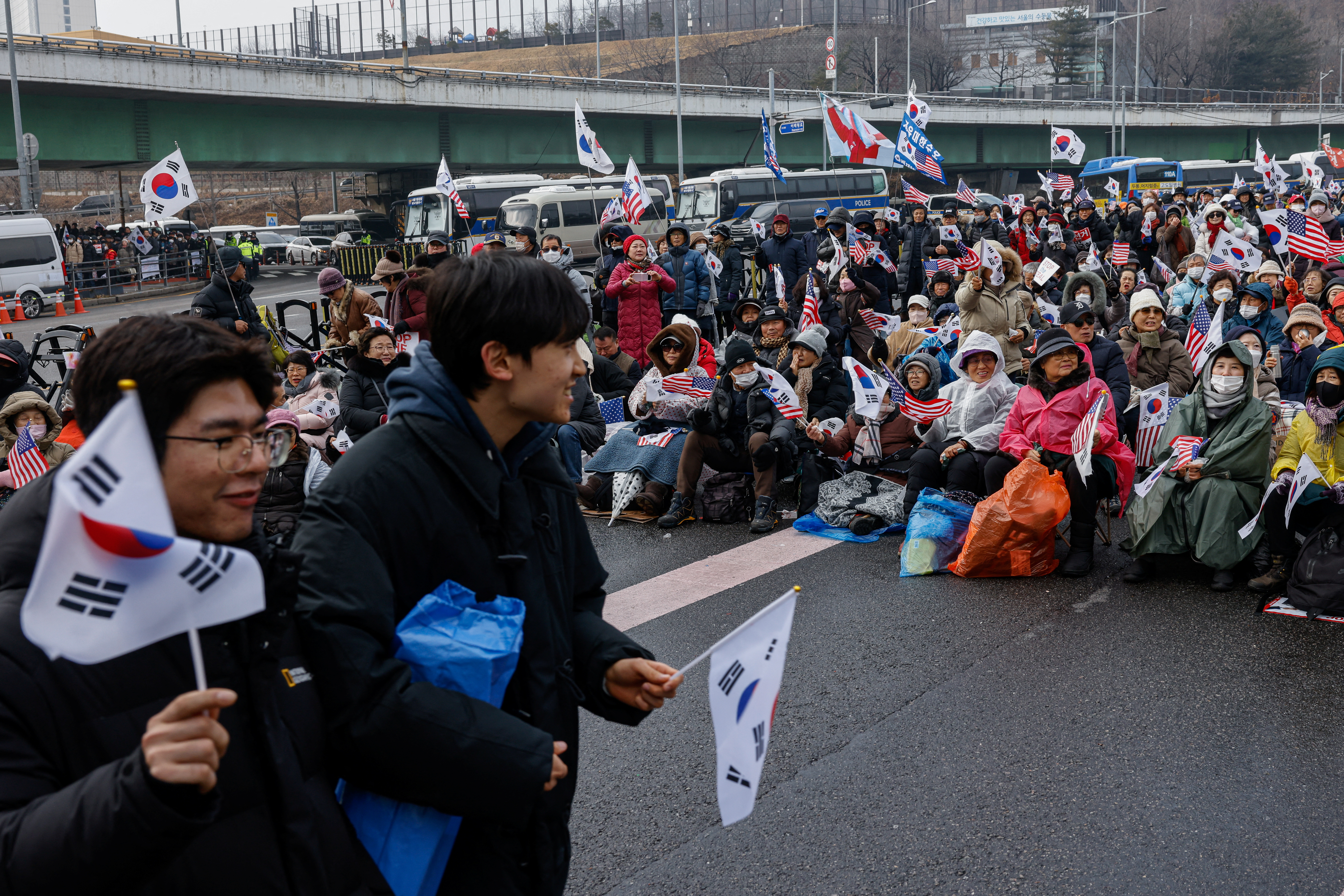 Pro-Yoon demonstrators attend a rally in support of impeached South Korean President Yoon Suk Yeol near his official residence, in Seoul, South Korea