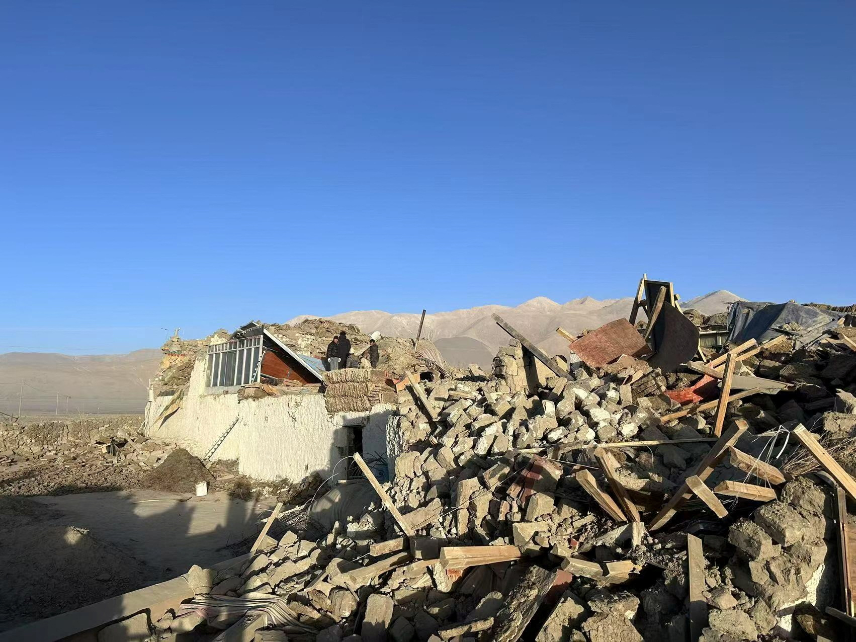 Damaged houses are pictured after an earthquake at a village in Shigatse, Tibet Autonomous Region, China January 7, 2025. Xinhua via REUTERS ATTENTION EDITORS - THIS IMAGE WAS PROVIDED BY A THIRD PARTY. CHINA OUT. NO RESALES. NO ARCHIVES.