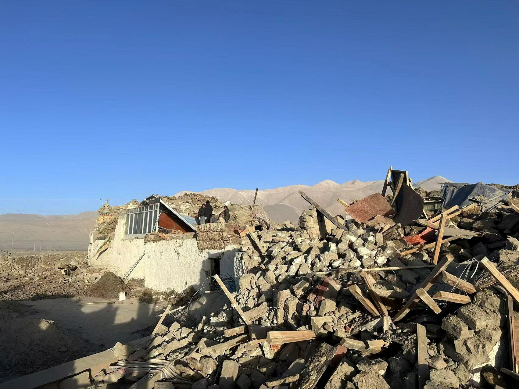Damaged houses are pictured after an earthquake at a village in Shigatse, Tibet Autonomous Region, China January 7