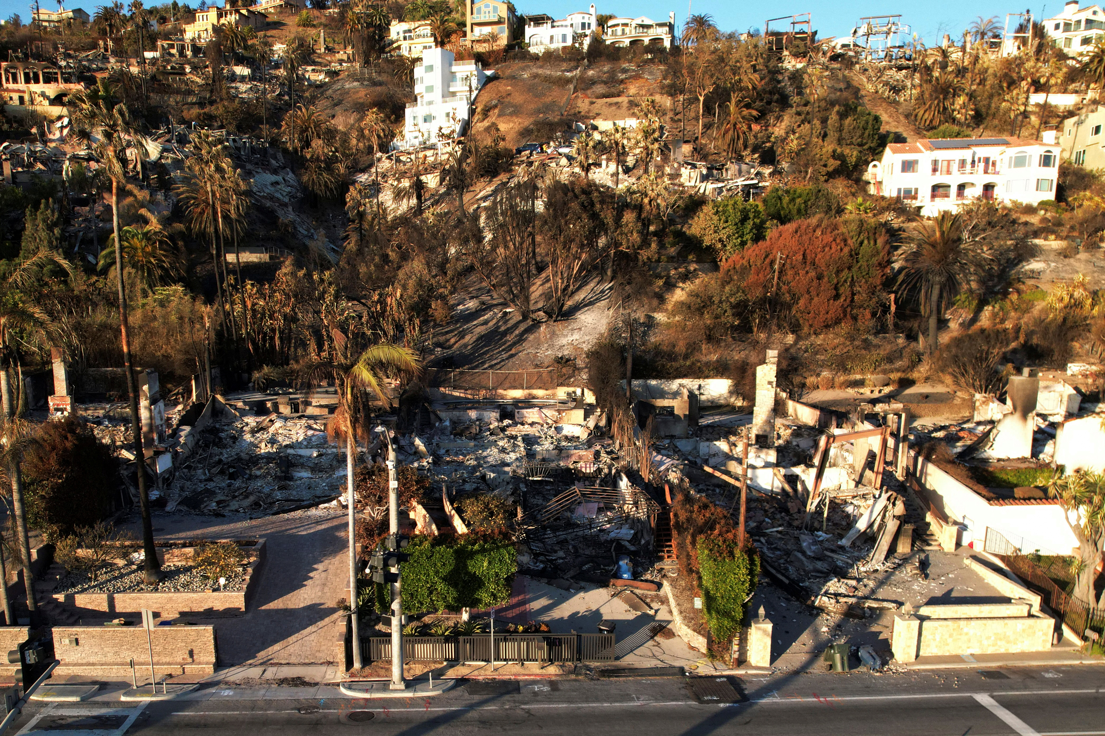 A drone view of houses destroyed during the Palisades Fire in Malibu, California