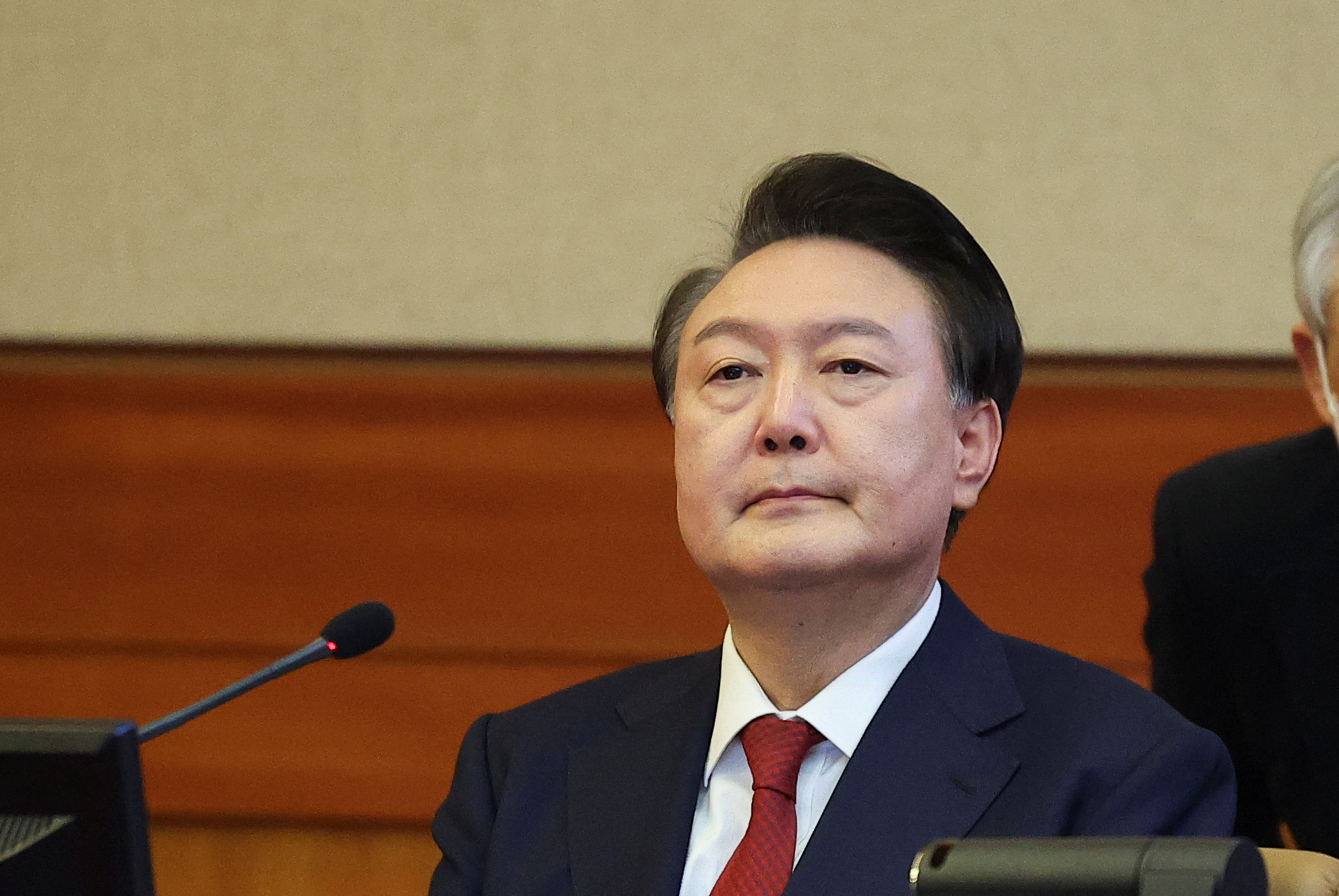 South Korea’s President Yoon Suk Yeol attends his impeachment trial.