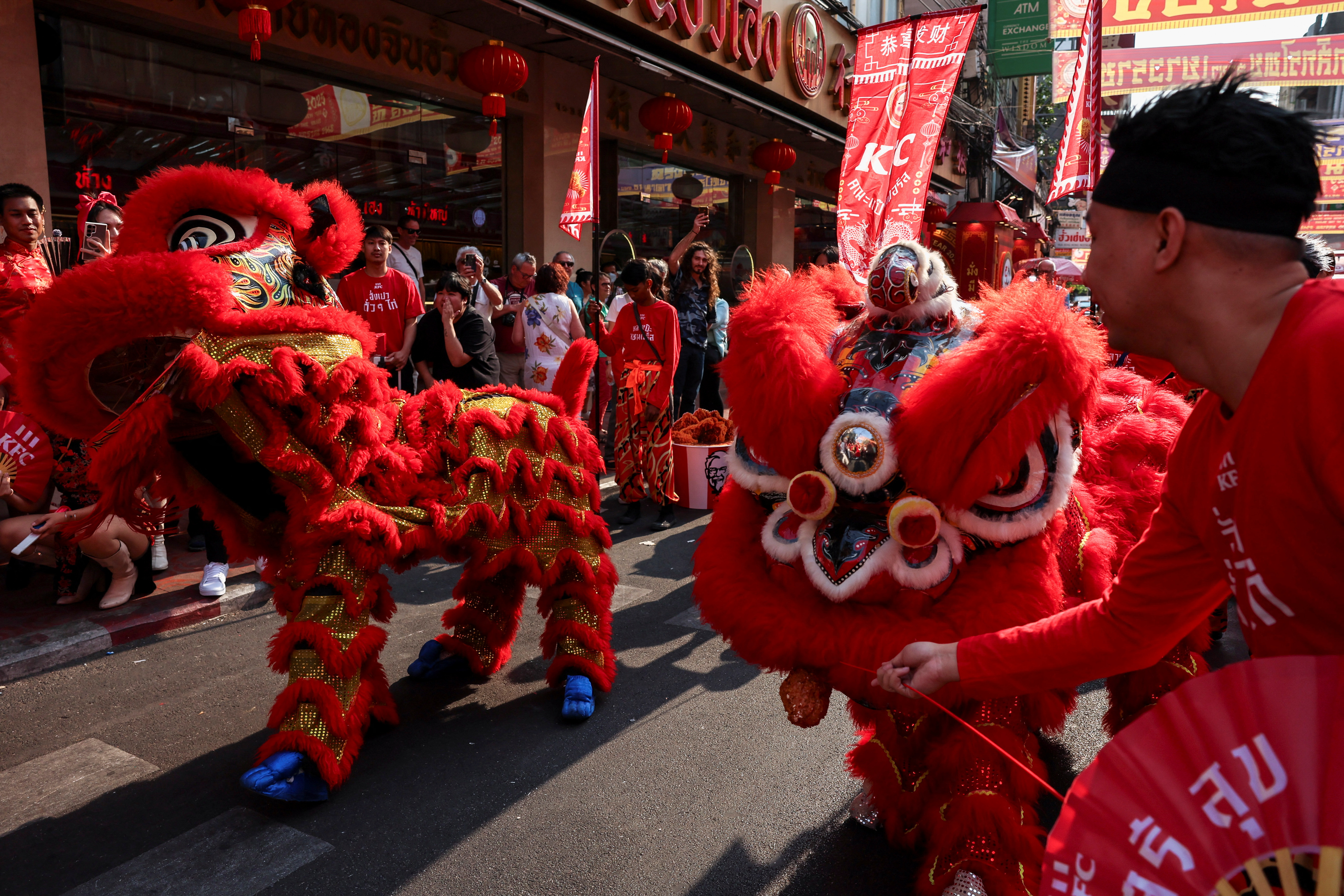A lion dance performance is seen ahead of the Chinese Lunar New Year celebrations in Bangkok's Chinatown, Thailand, January 27, 2025. REUTERS/Chalinee Thirasupa