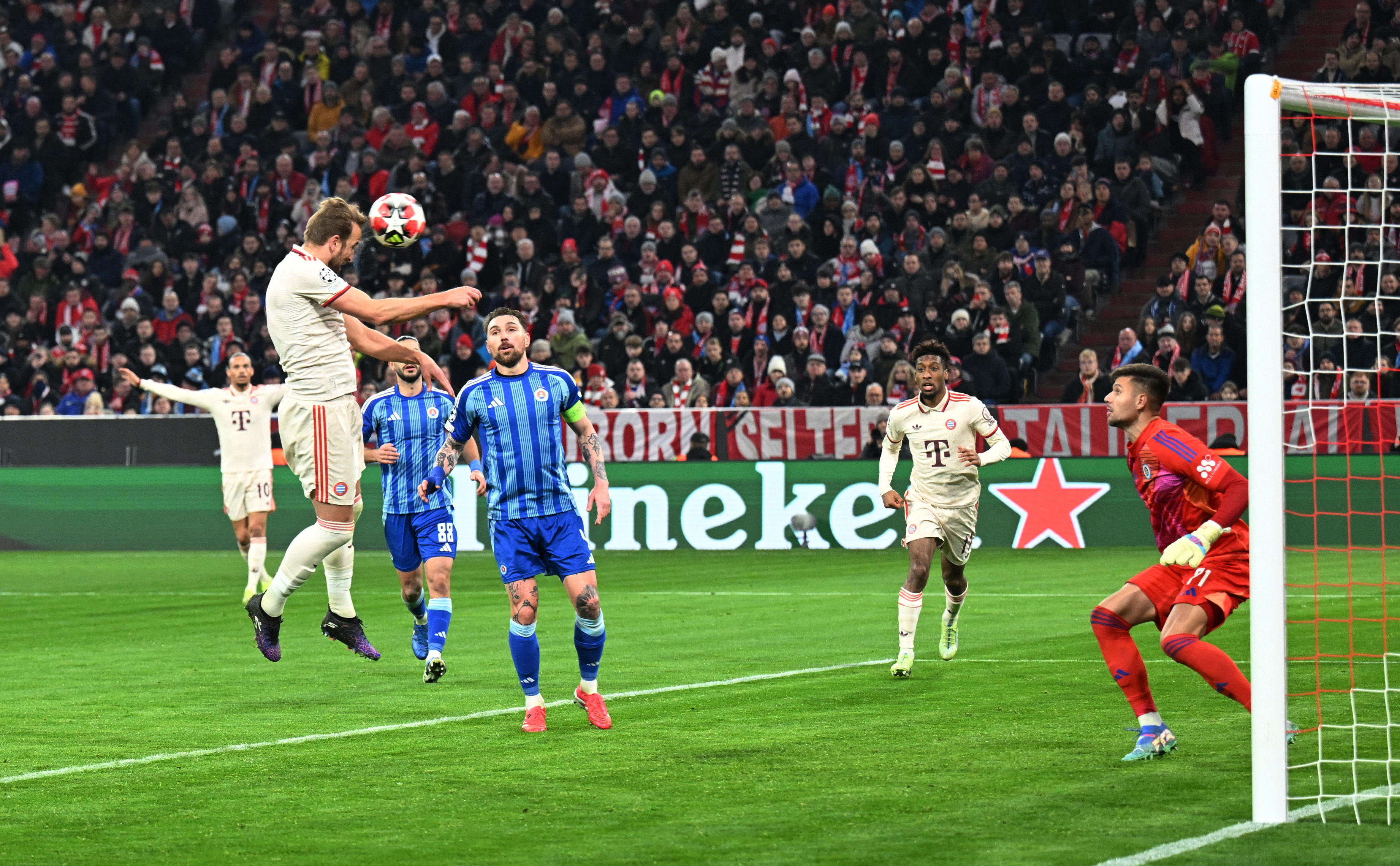 Soccer Football - Champions League - Bayern Munich v Slovan Bratislava - Allianz Arena, Munich, Germany - January 29, 2025 Bayern Munich's Harry Kane scores their second goal REUTERS/Angelika Warmuth