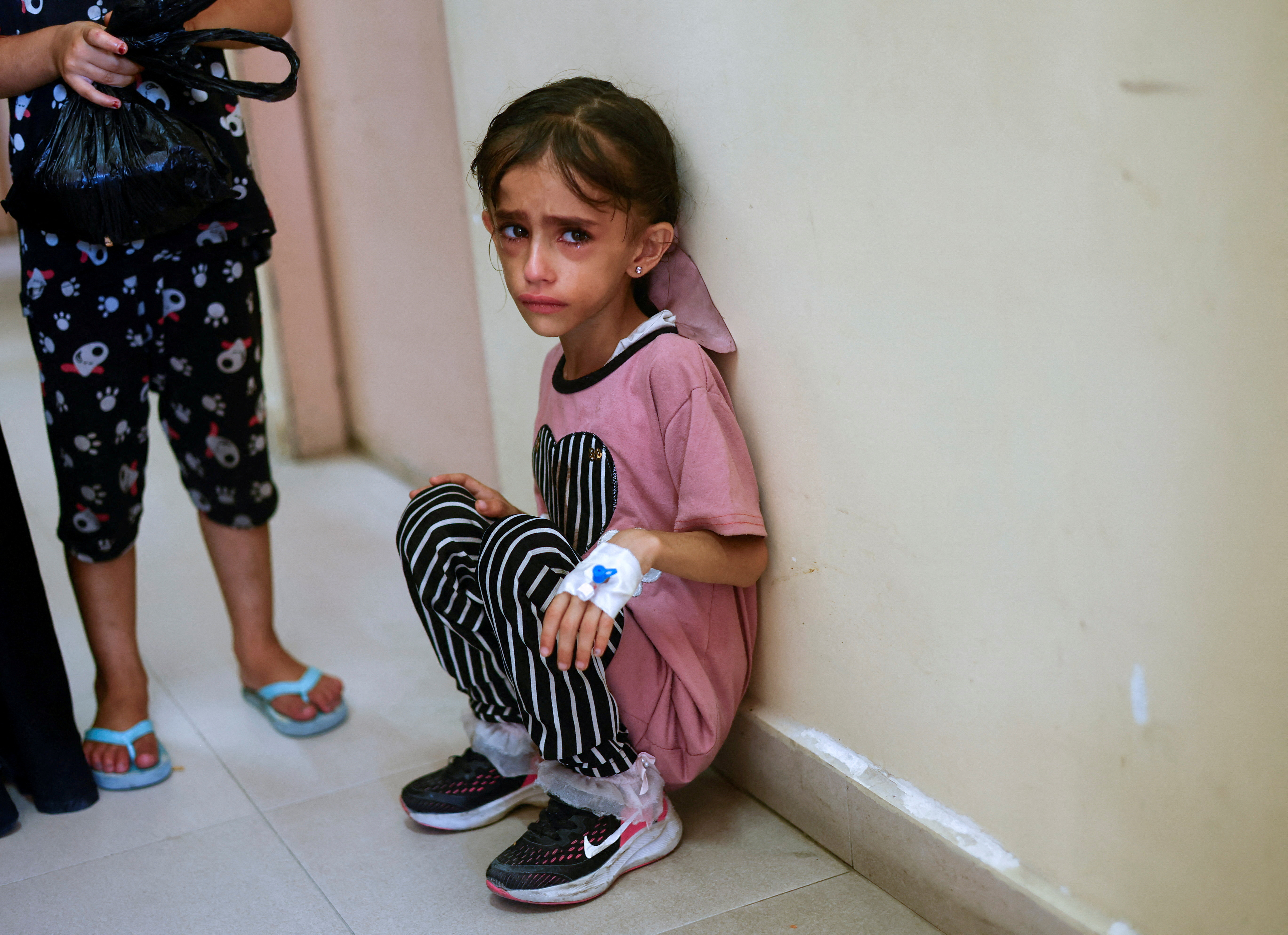 A Palestinian girl who suffers from cancer and malnutrition.