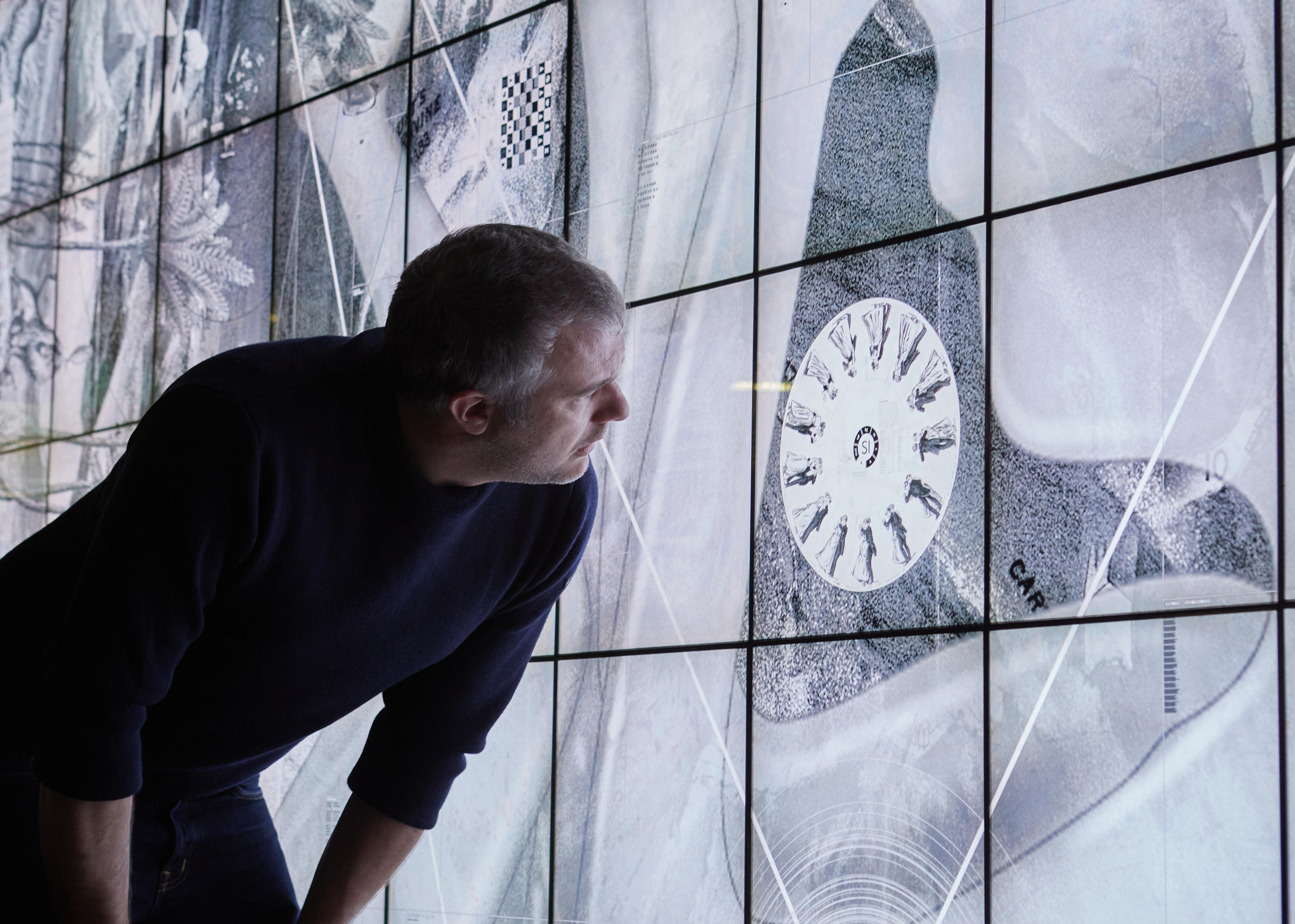 Benoit Faiveley, founder of the Sanctuary project, looks at some of the designs of the ‘Life’ disc on the Wilder images wall at Inria Saclay, Paris. This wall is the biggest ‘pinch-to-zoom display’ in Europe and enables the team to check all the content on the discs [Courtesy of Vincent Thomas]