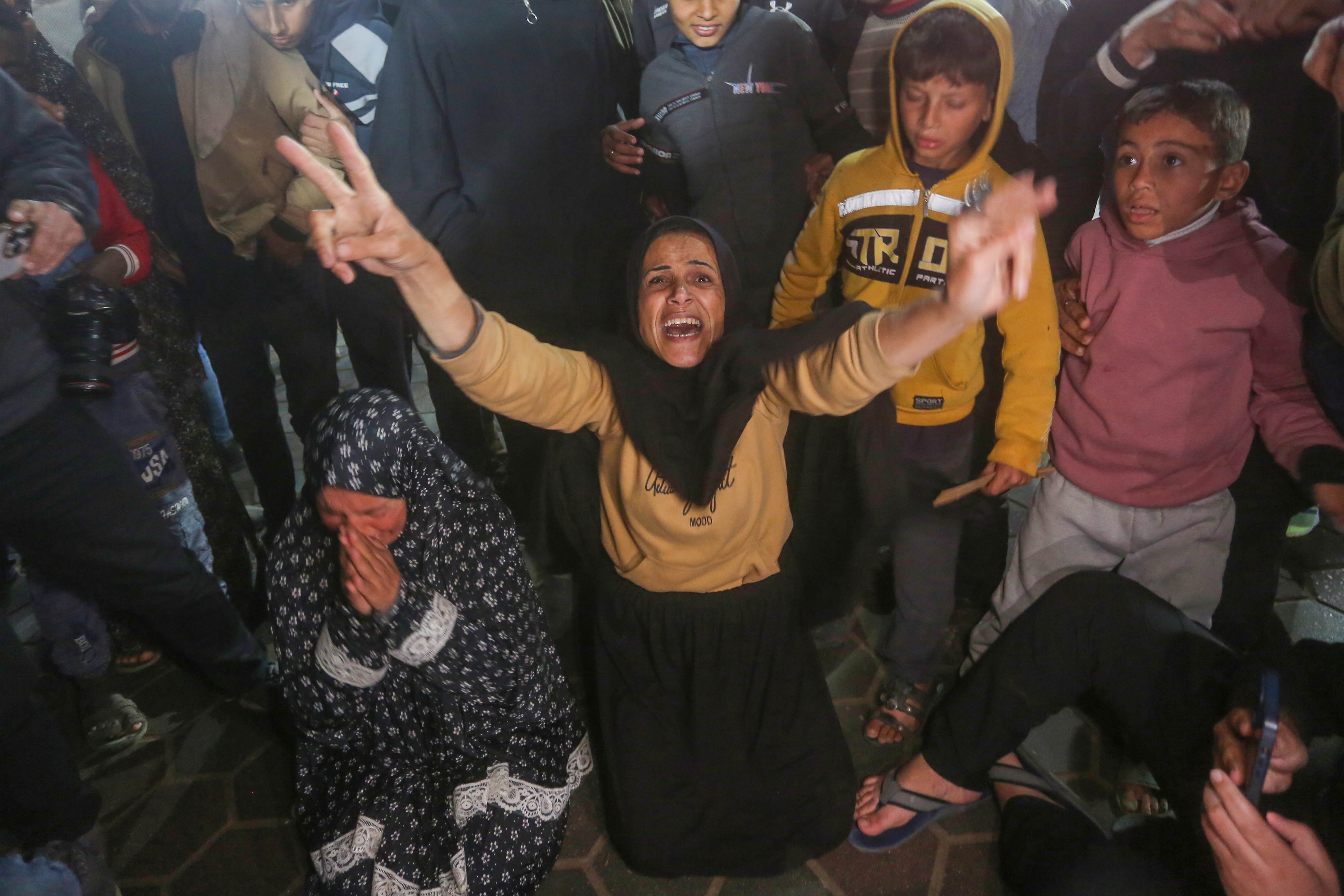 Palestinians gather to celebrate after US President-elect Donald Trump's announcement of hostage deal, on January 15, 2025 in Deir al-Balah, Gaza. Trump on Wednesday announced a deal has been reached for hostages in Gaza amid reports that Israel and Hamas agreed to a cease-fire deal. [Ashraf Amra/Anadolu Agency]
