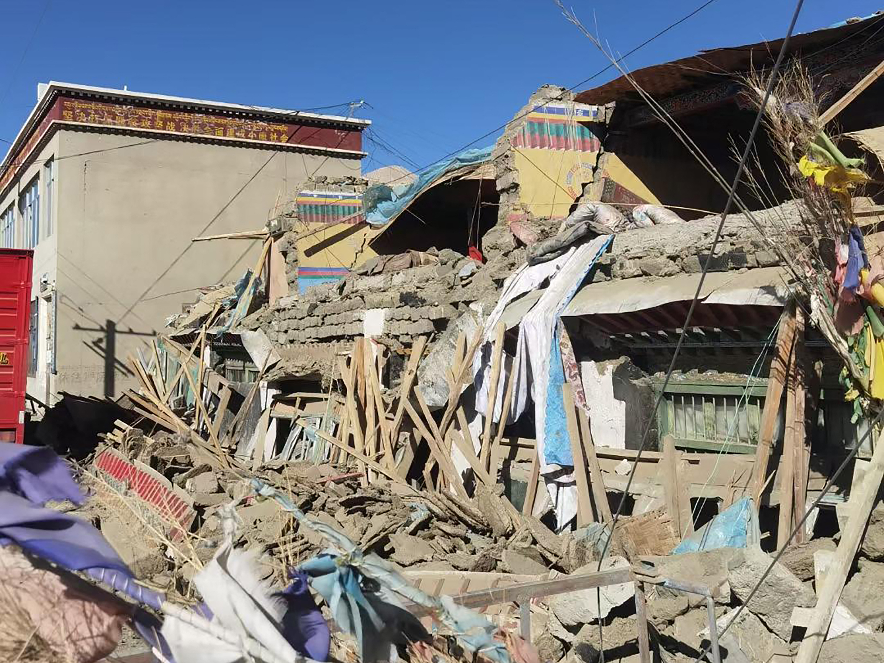 This handout received on January 7, 2025 shows damaged houses in Shigatse, southwestern China's Tibet region, after an earthquake hit the area