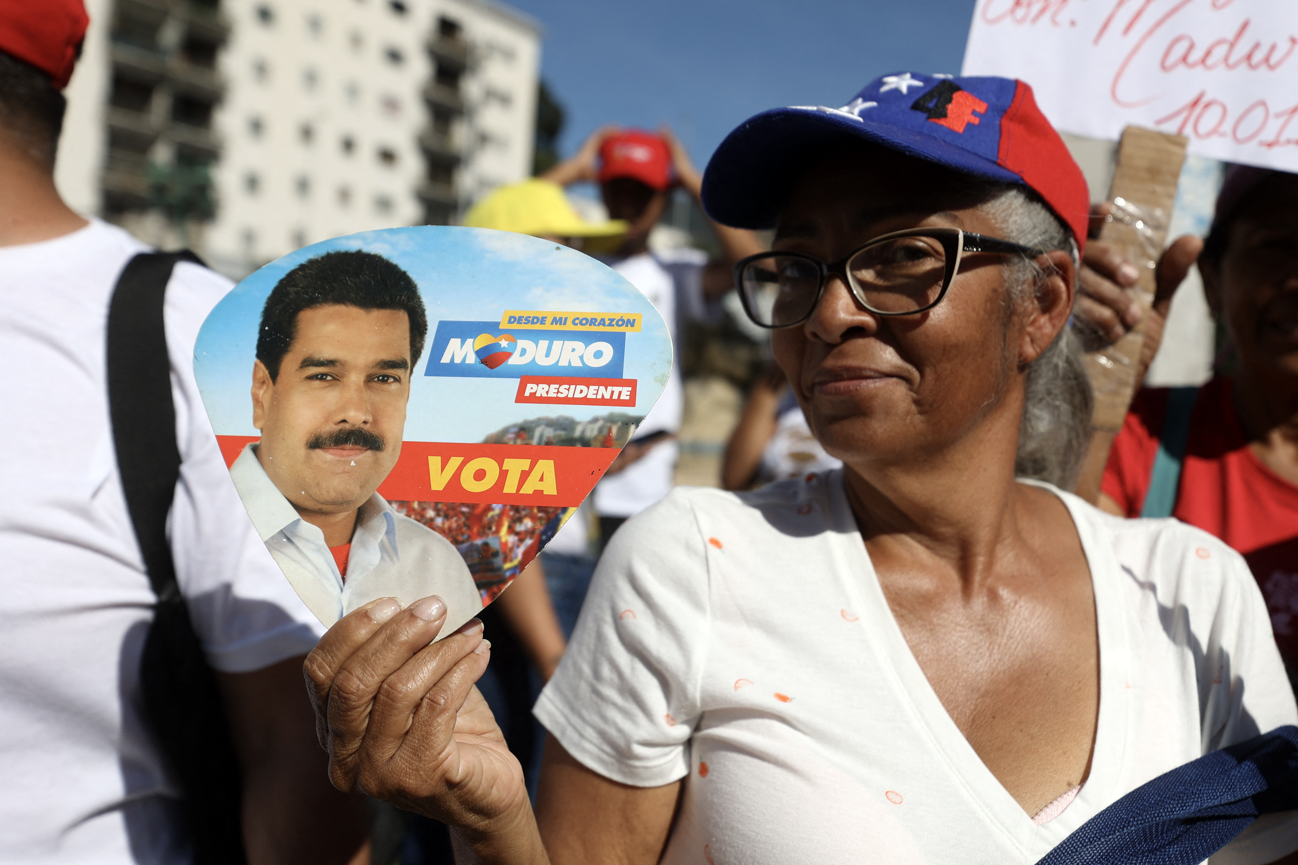 A supporter of Venezuela's President Nicolas Maduro take spart in a rally during the presidential inauguration, in Caracas on January 10, 2025. Maduro, in power since 2013, took the oath of office for a third term despite a global outcry that brought thousands out in protest on the ceremony's eve