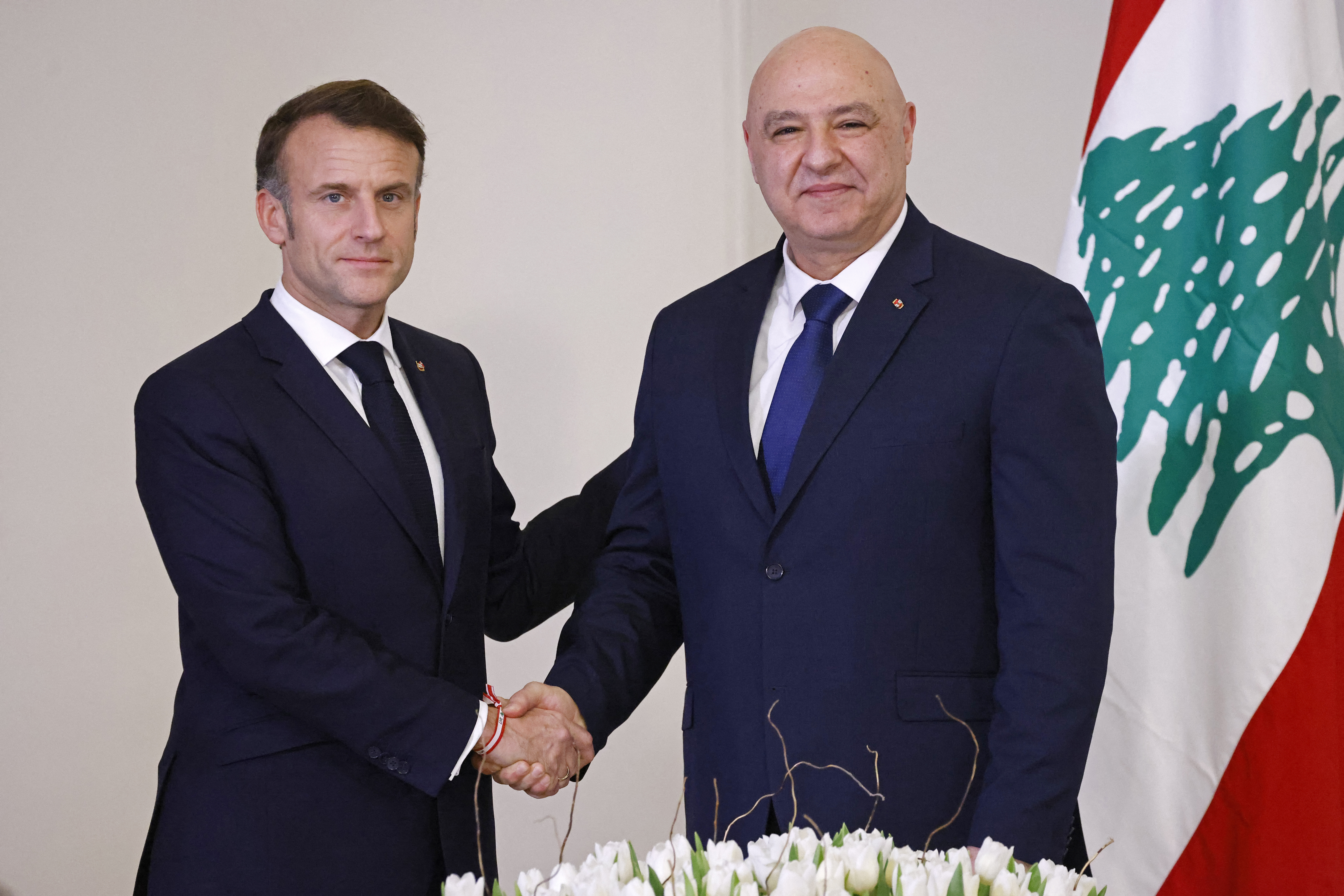 LebanonFrance's President Emmanuel Macron (L) shakes hands with his Lebanon's counterpart Joseph Aoun at the presidential palace in Baabda on January 17, 2025. Macron on January 17 announced that Paris would in the coming weeks host an international conference "for the reconstruction of Lebanon" after a war between militant group Hezbollah and Israel. (Photo by Ludovic MARIN / AFP)France's President Emmanuel Macron (L) shakes hands with his Lebanon's counterpart Joseph Aoun at the presidential palace in Baabda on January 17, 2025. Macron on January 17 announced that Paris would in the coming weeks host an international conference "for the reconstruction of Lebanon" after a war between militant group Hezbollah and Israel. (Photo by Ludovic MARIN / AFP)