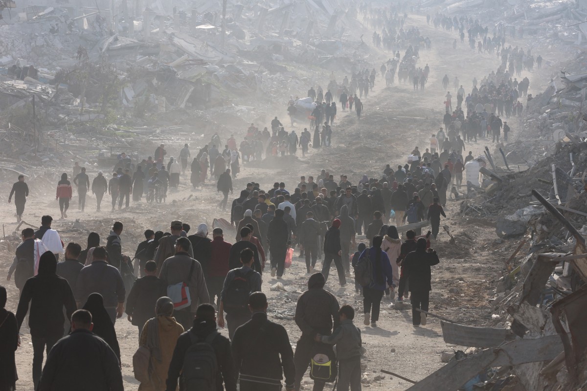 Palestinians celebrate the ceasefire announcement
