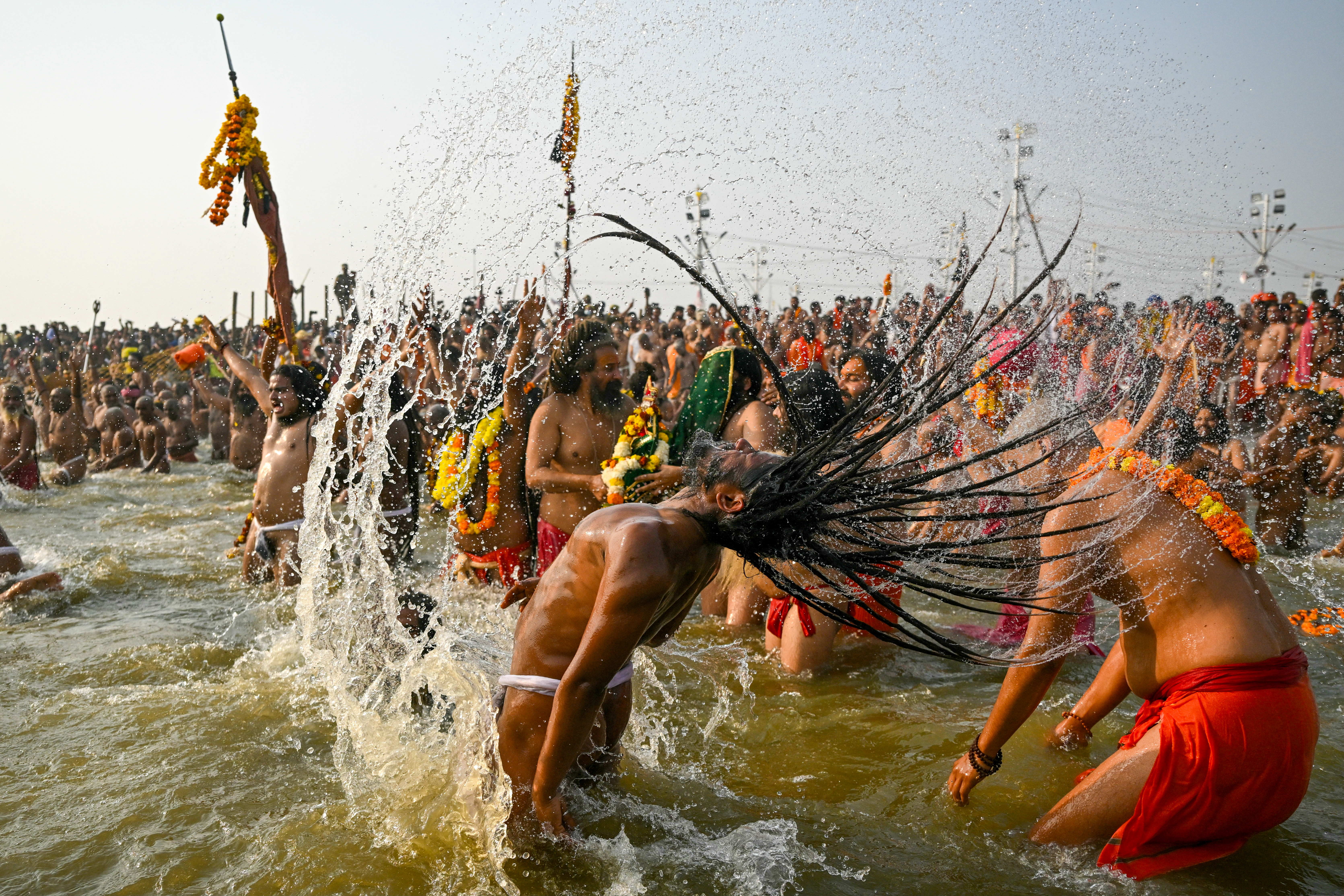 3 Millions of Hindus take 'holy dip' a day after fatal stampede