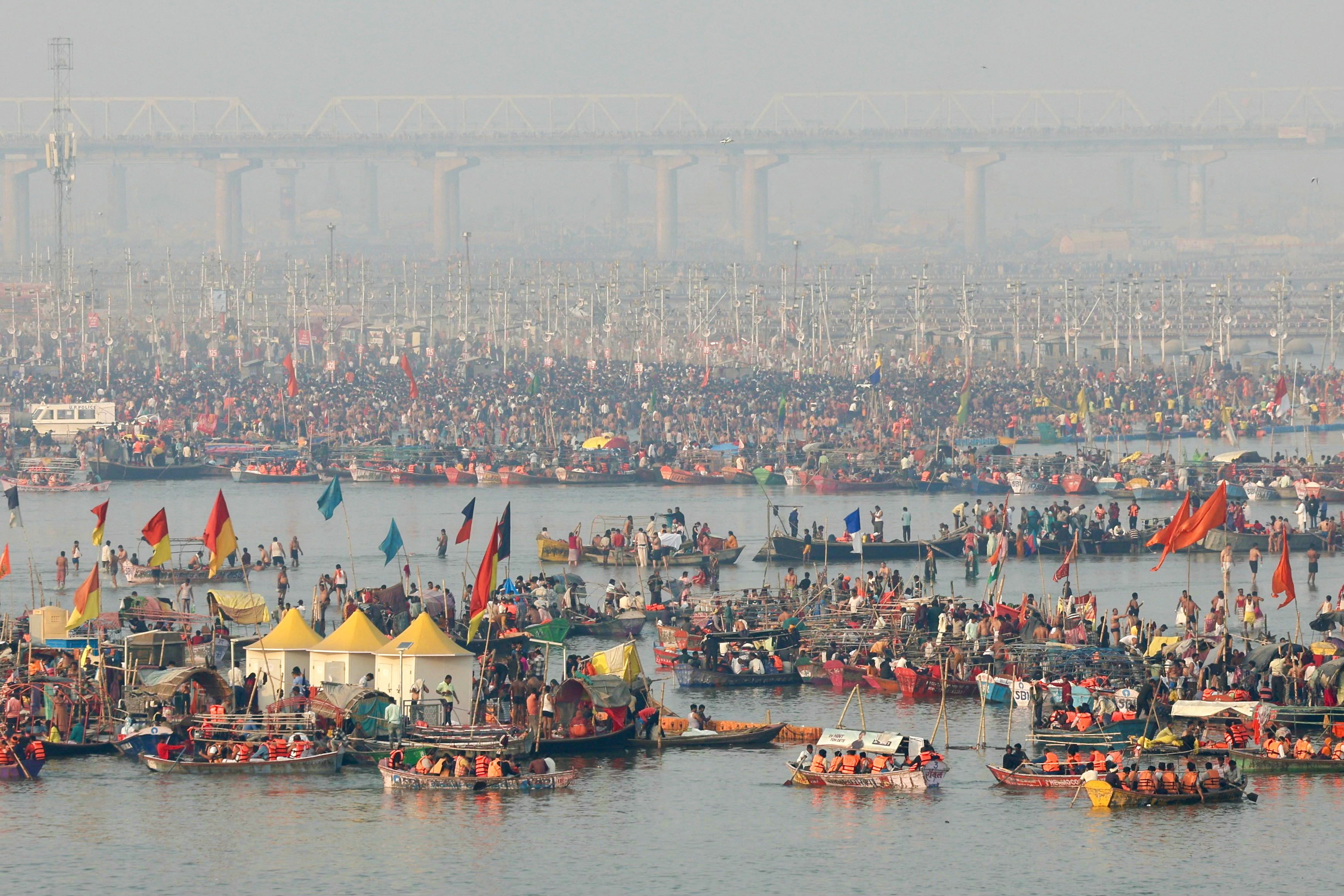 3 Millions of Hindus take 'holy dip' a day after fatal stampede