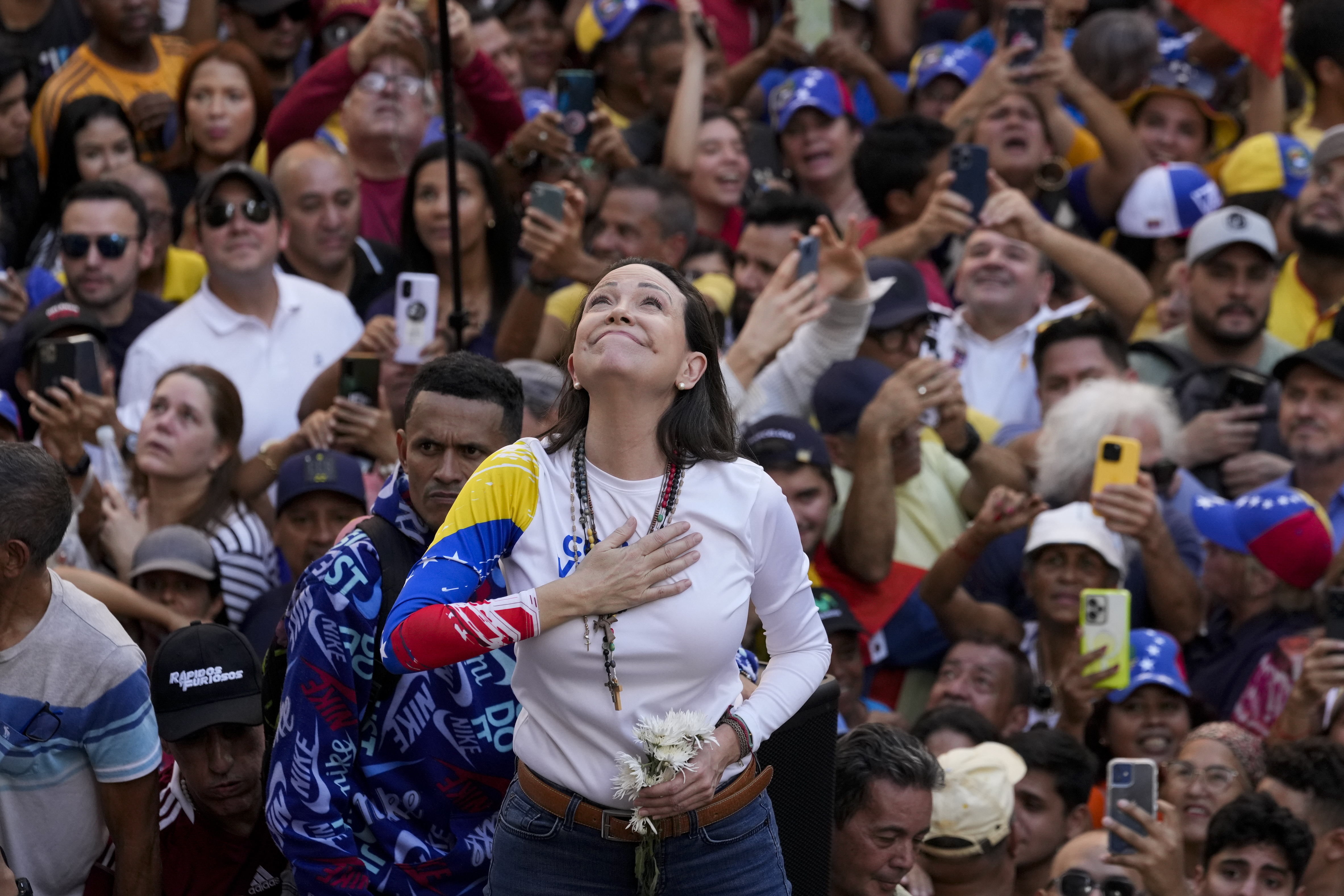 Venezuelan opposition leader Maria Corina Machado addresses supporters at a protest.