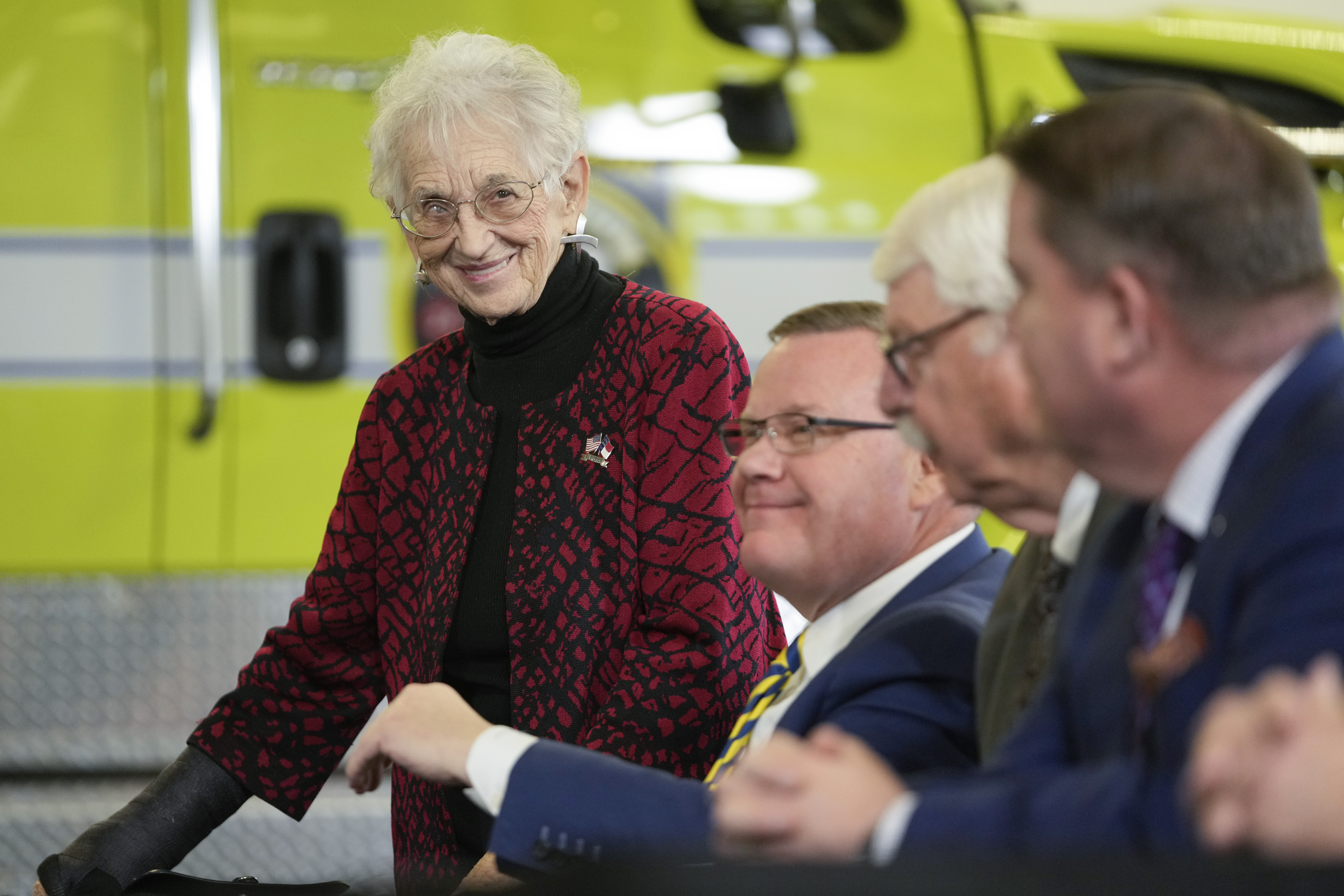 Representative Virgina Foxx sits down at a Trump press conference in North Carolina