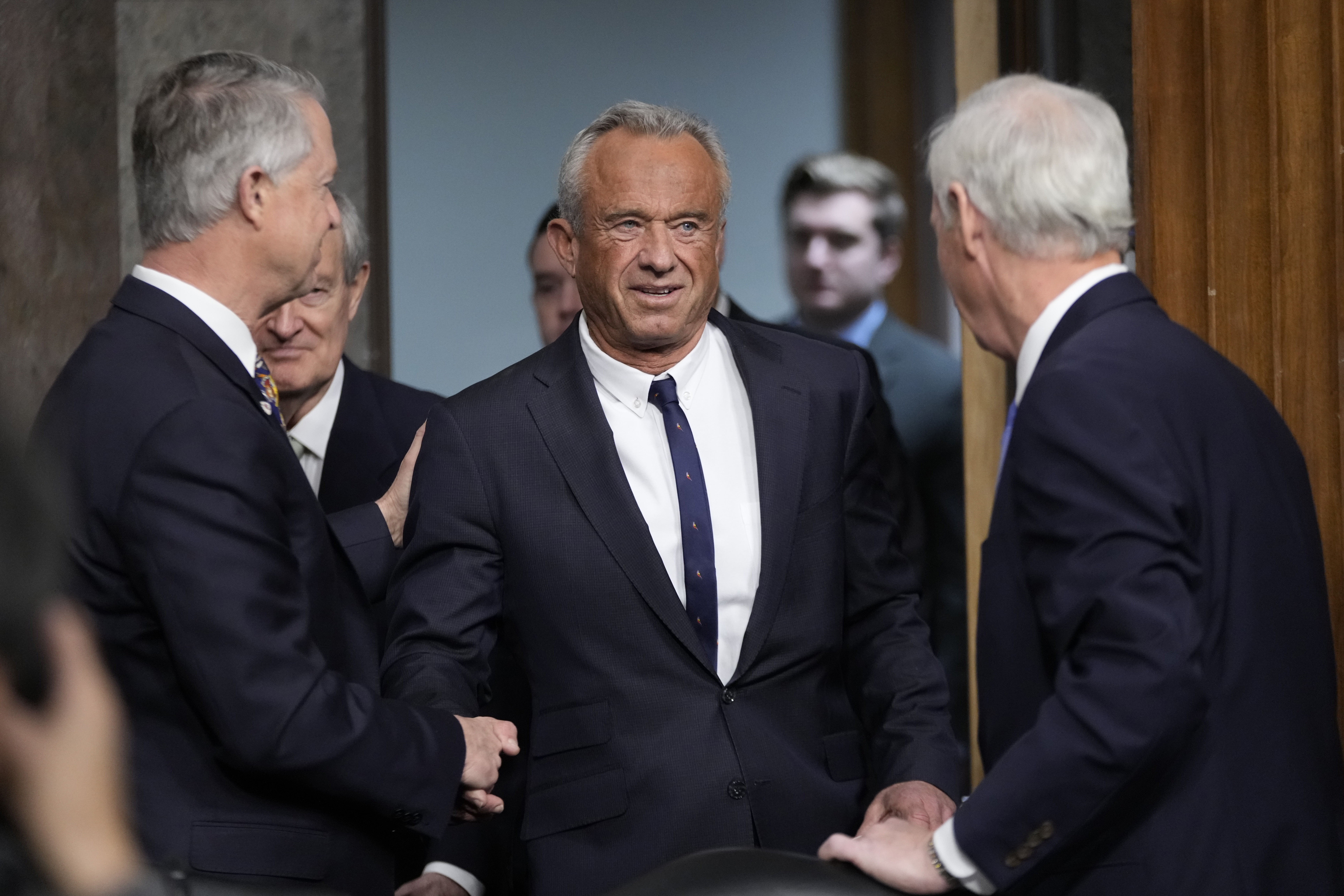 Robert F. Kennedy Jr. arrives to appear before the Senate Finance Committee.