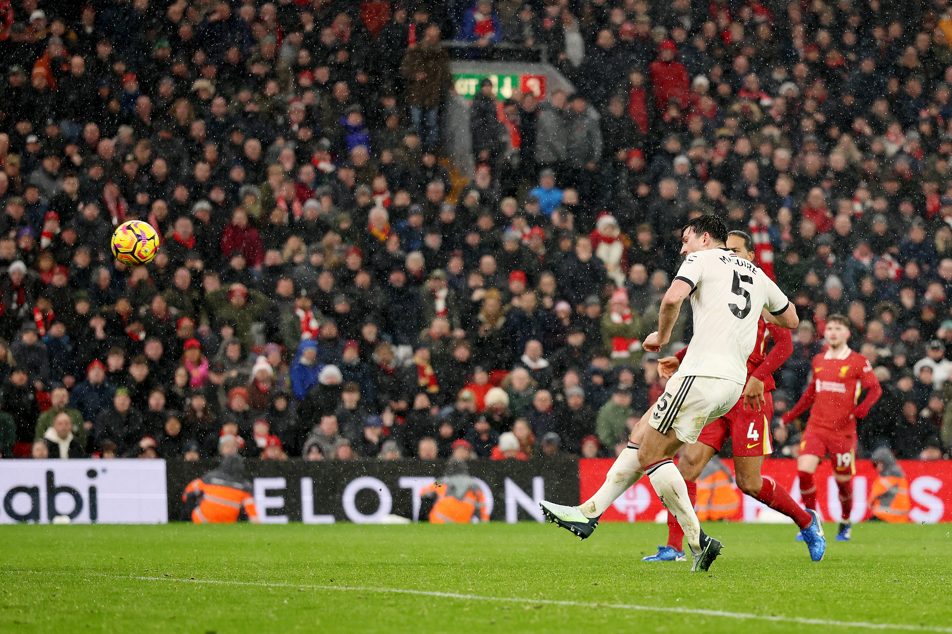 LIVERPOOL, ENGLAND - JANUARY 05: Harry Maguire of Manchester United misses a chance during the Premier League match between Liverpool FC and Manchester United FC at Anfield on January 05, 2025 in Liverpool, England. (Photo by Carl Recine/Getty Images)