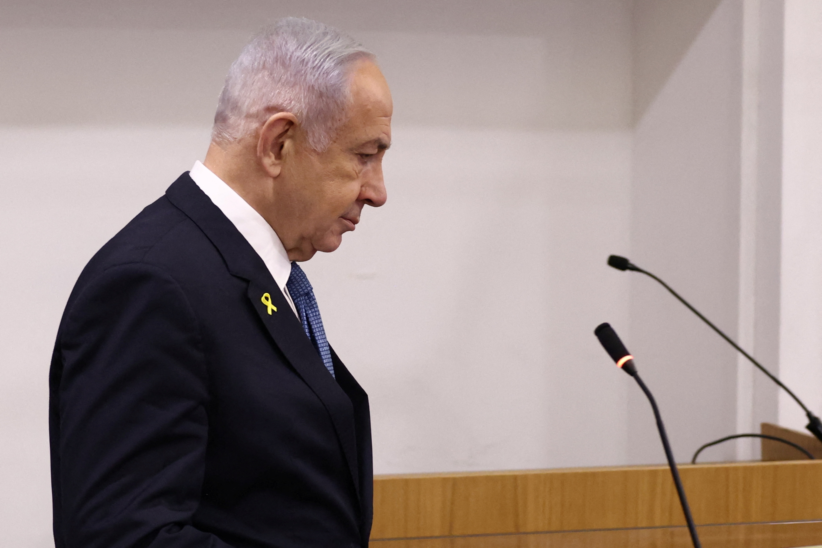 Israeli Prime Minister Benjamin Netanyahu attends his trial on corruption charges at the district court in Tel Aviv.
