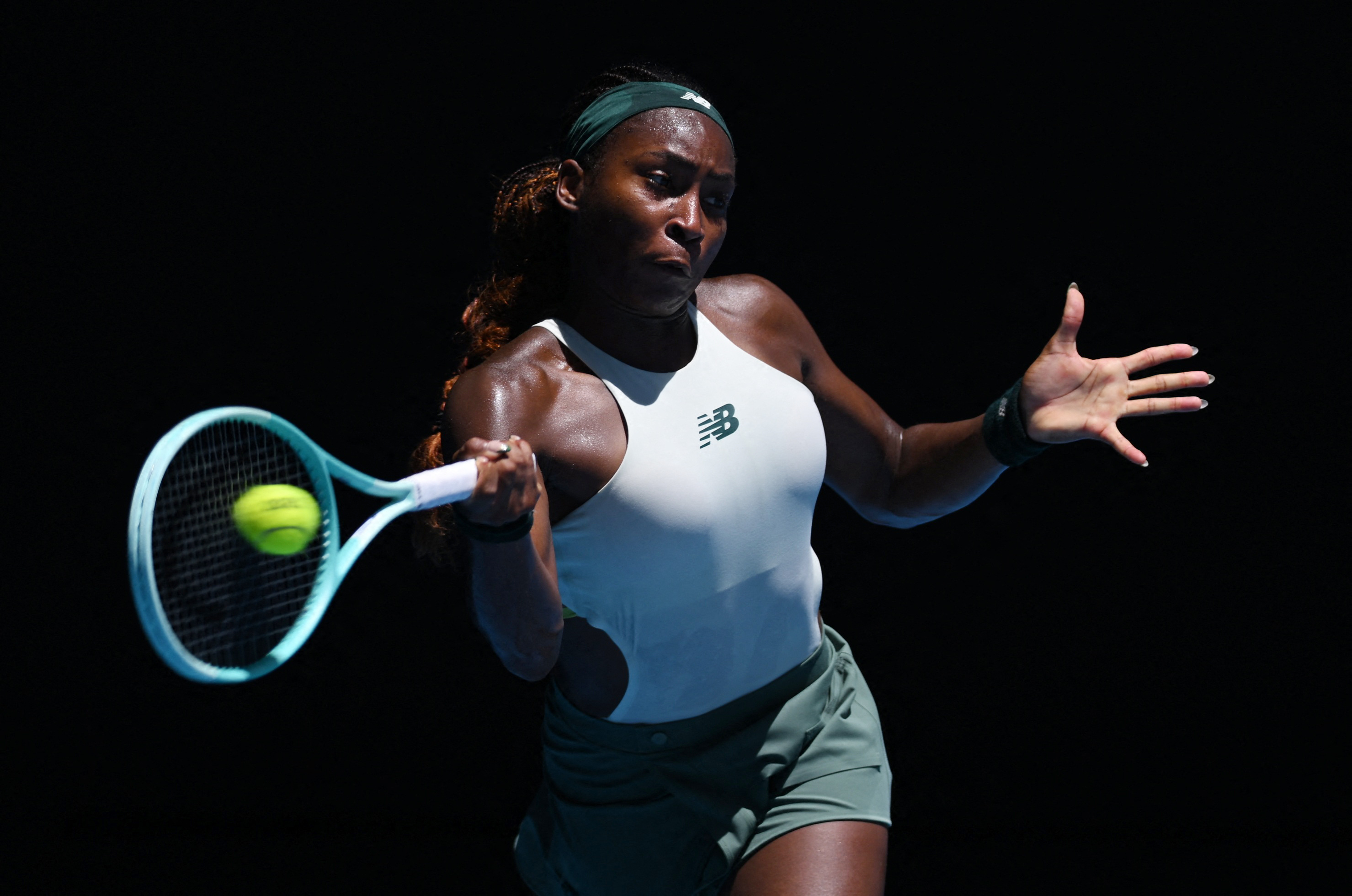 Tennis - Australian Open - Melbourne Park, Melbourne, Australia - January 21, 2025 Coco Gauff of the U.S. in action during her quarter final match against Spain's Paula Badosa REUTERS/Jaimi Joy