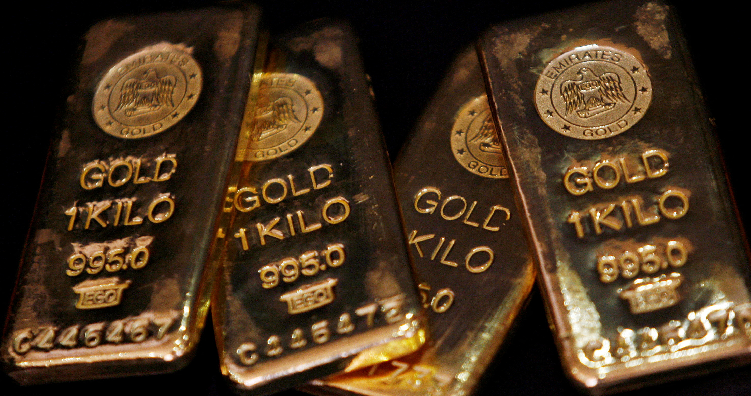 FILE PHOTO: Gold bars are displayed to be photographed at bullion house in Mumbai December 3, 2009. REUTERS/Arko Datta/File Photo