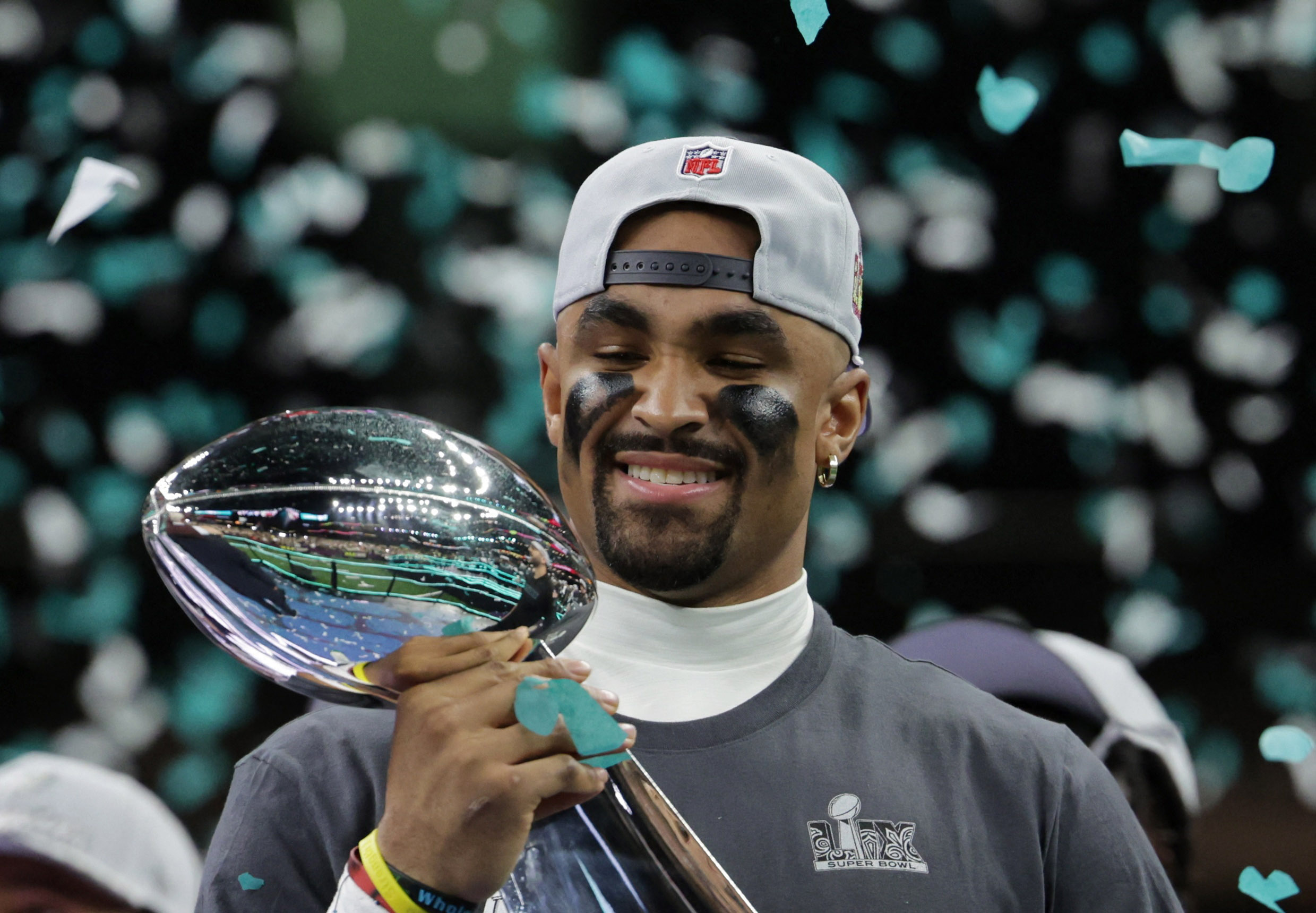 Football - NFL - Super Bowl LIX - Philadelphia Eagles v Kansas City Chiefs - Caesars Superdome, New Orleans, Louisiana, United States - February 9, 2025 Philadelphia Eagles' Jalen Hurts celebrates with the Vince Lombardi Trophy after winning Super Bowl LIX REUTERS/Mike Segar