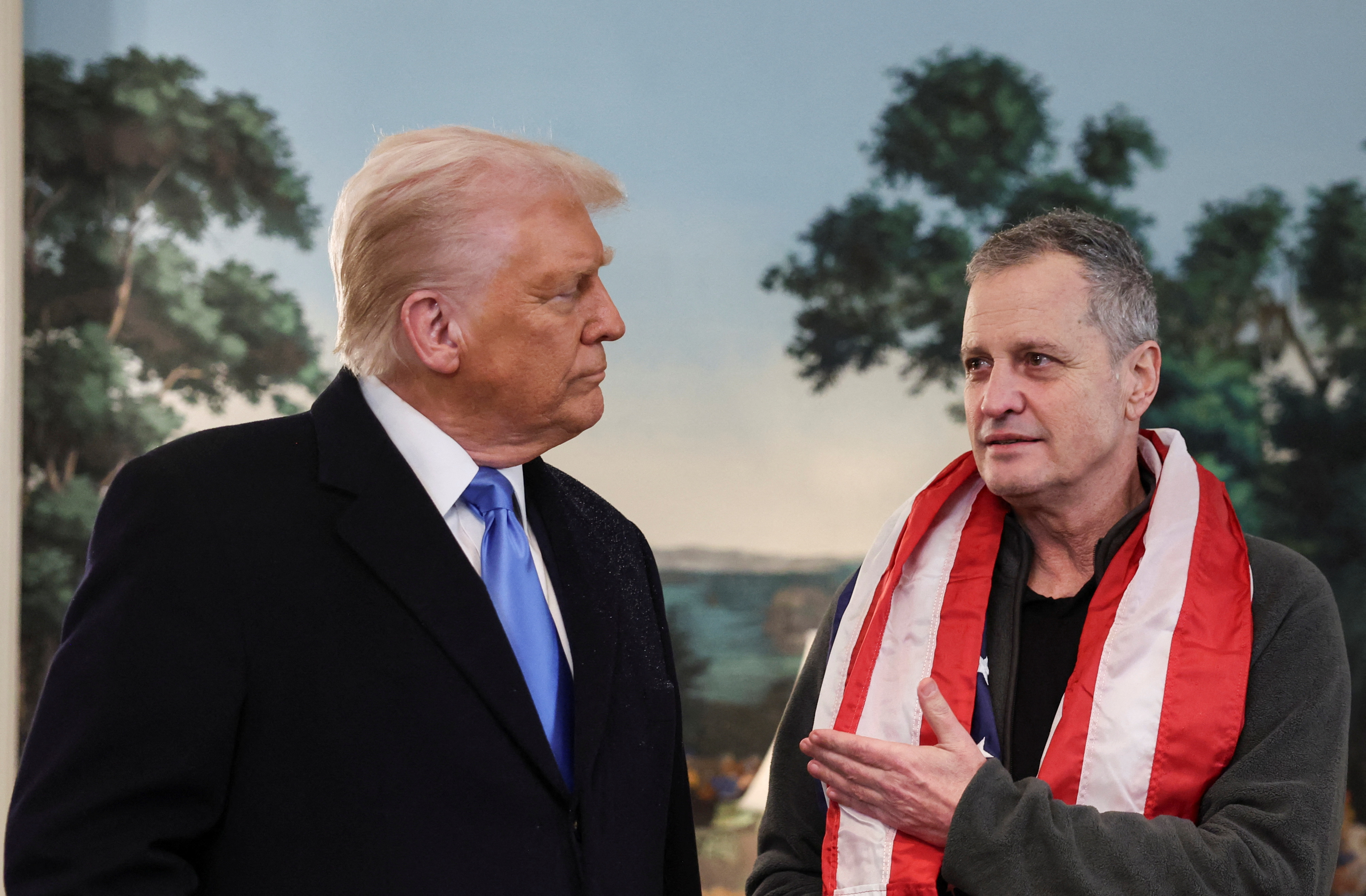 U.S. President Donald Trump holds an event to welcome back released American schoolteacher Marc Fogel, who had been held in Russia since 2021, at the White House in Washington, D.C., U.S., February 11, 2025. REUTERS/Kevin Lamarque