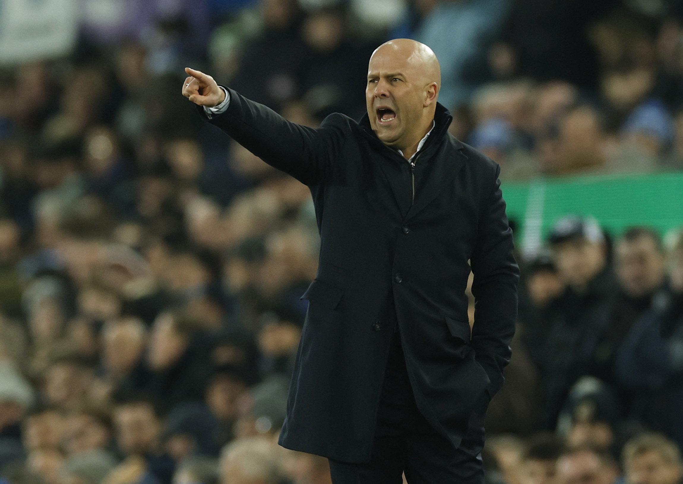 Liverpool manager Arne Slot reacts during a match.