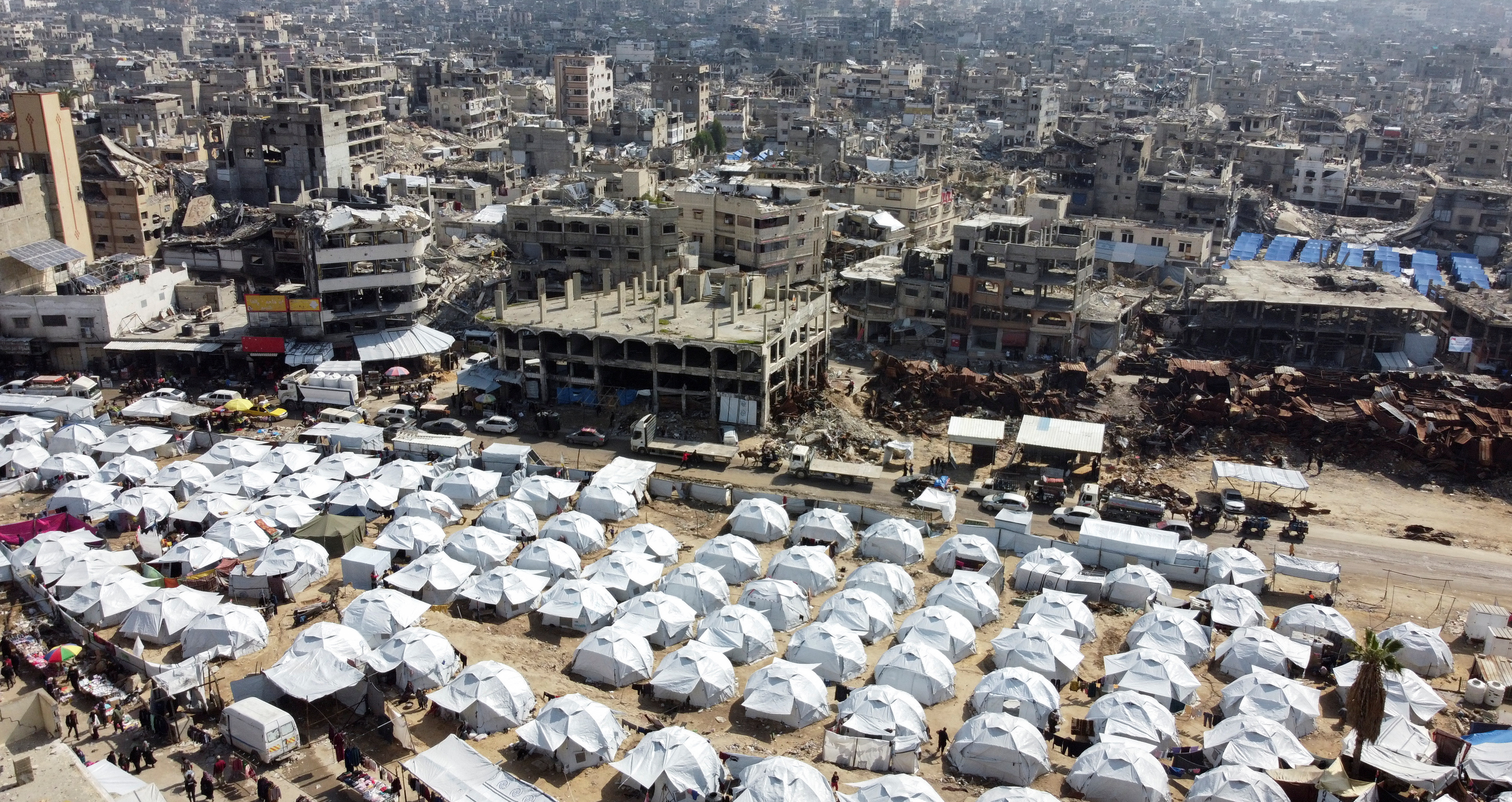A drone view shows displaced Palestinians sheltering in a tent camp, amid a ceasefire between Israel and Hamas, in Gaza City February 17, 2025. REUTERS/Dawoud Abu Alkas