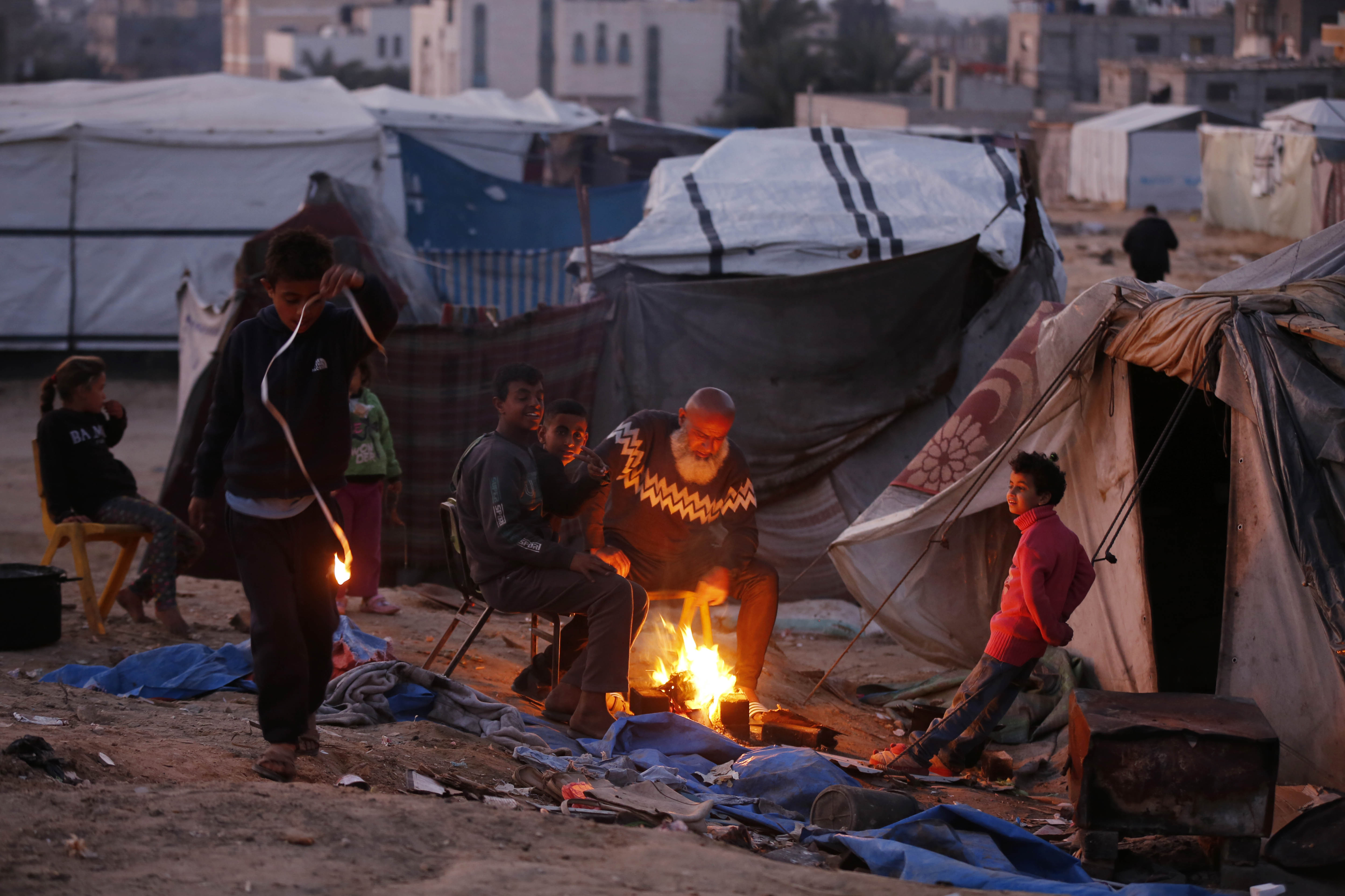 Palestinians in Gaza struggle to survive in makeshift tents amid harsh winter conditions