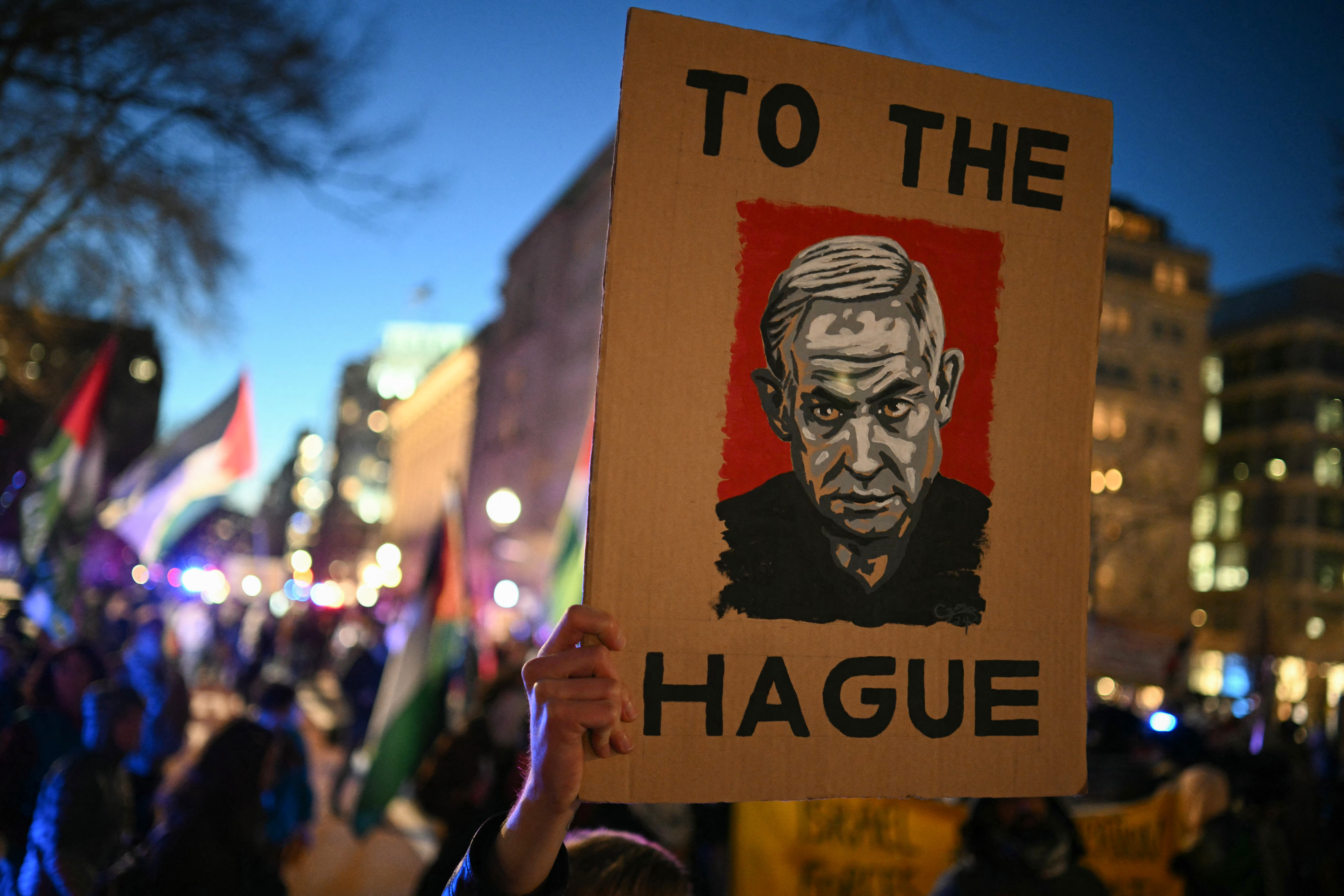 a poster says to The Hague with a picture of a man