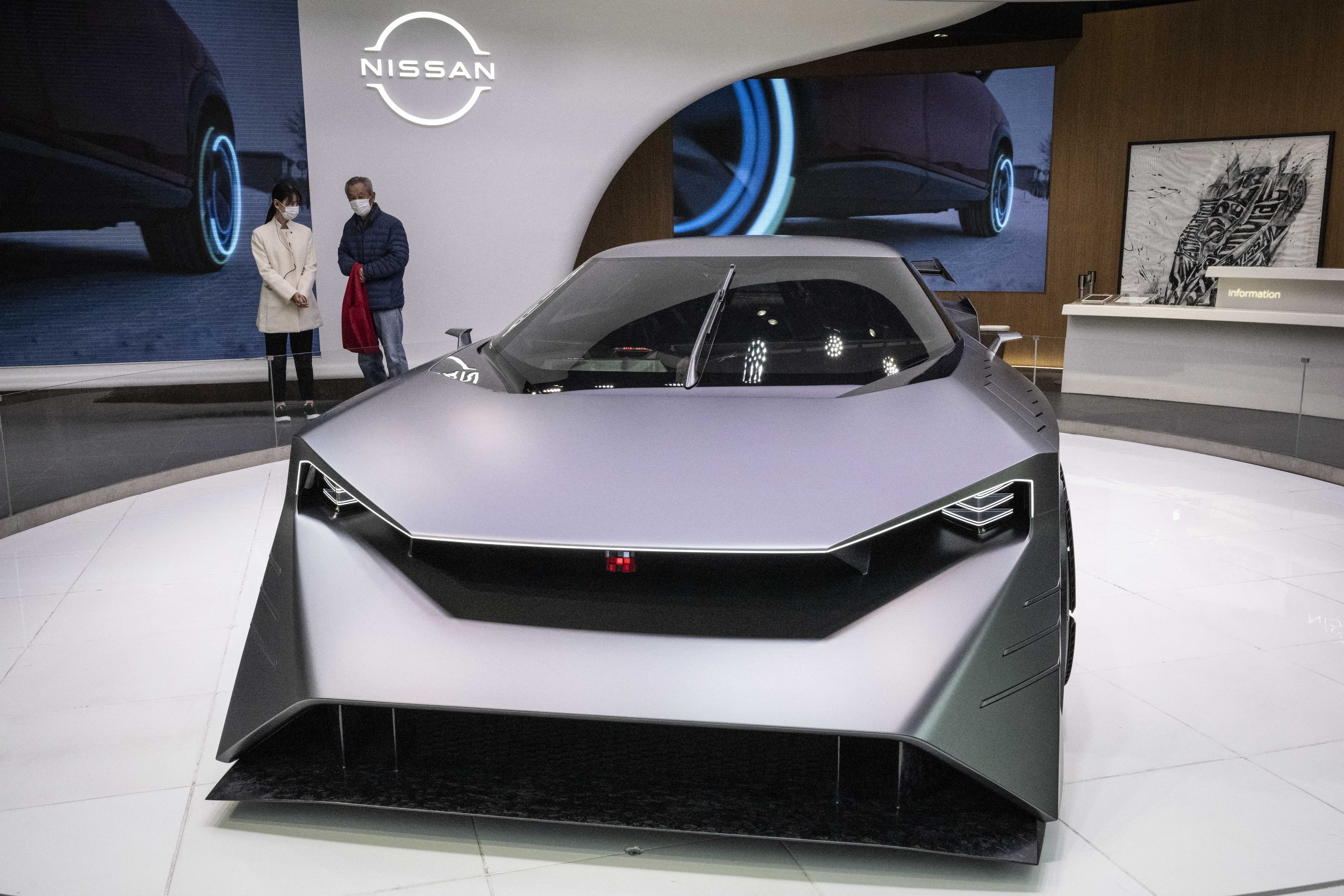 A man visits a showroom for Japanese automaker Nissan.