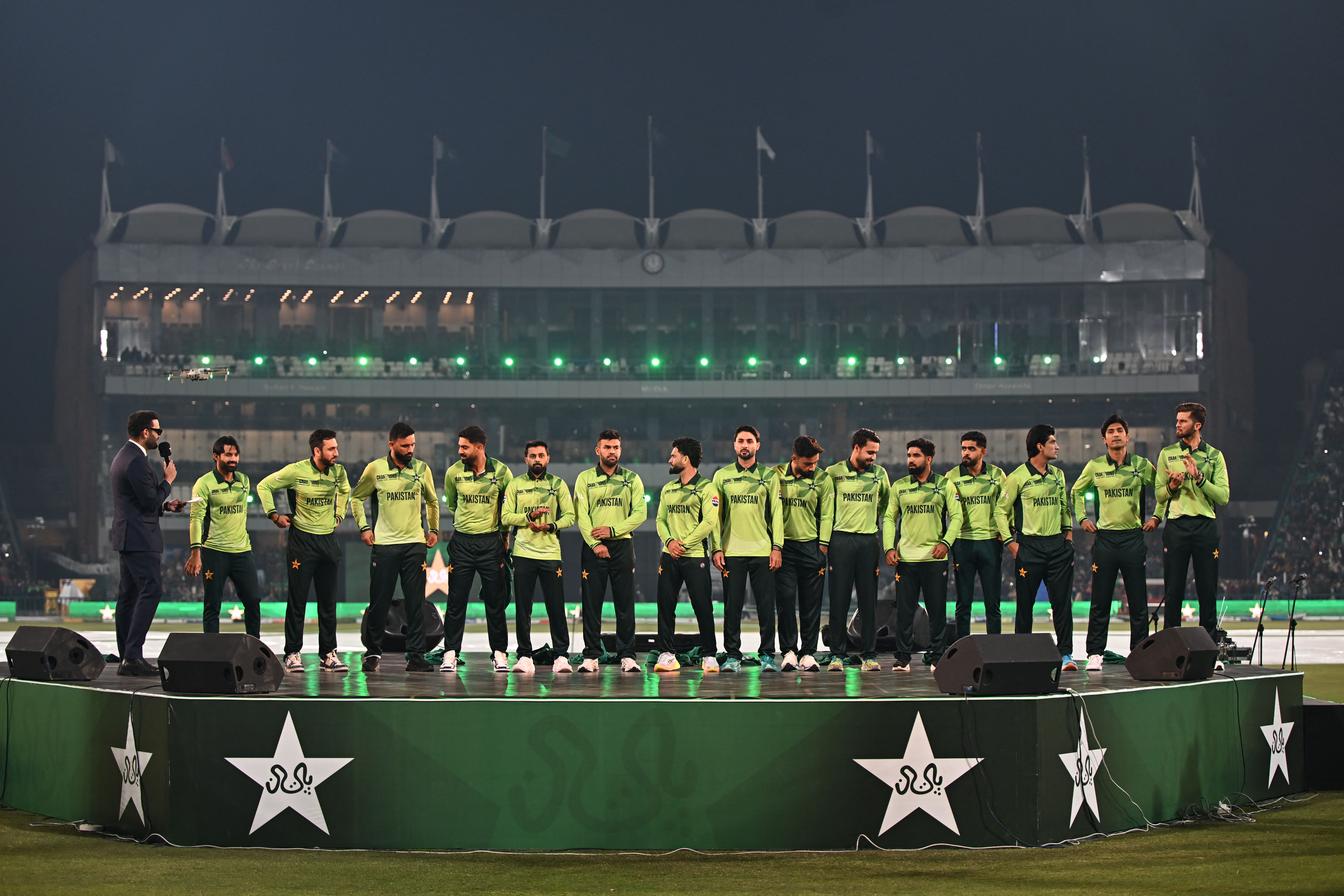 Pakistan cricket players on platform.